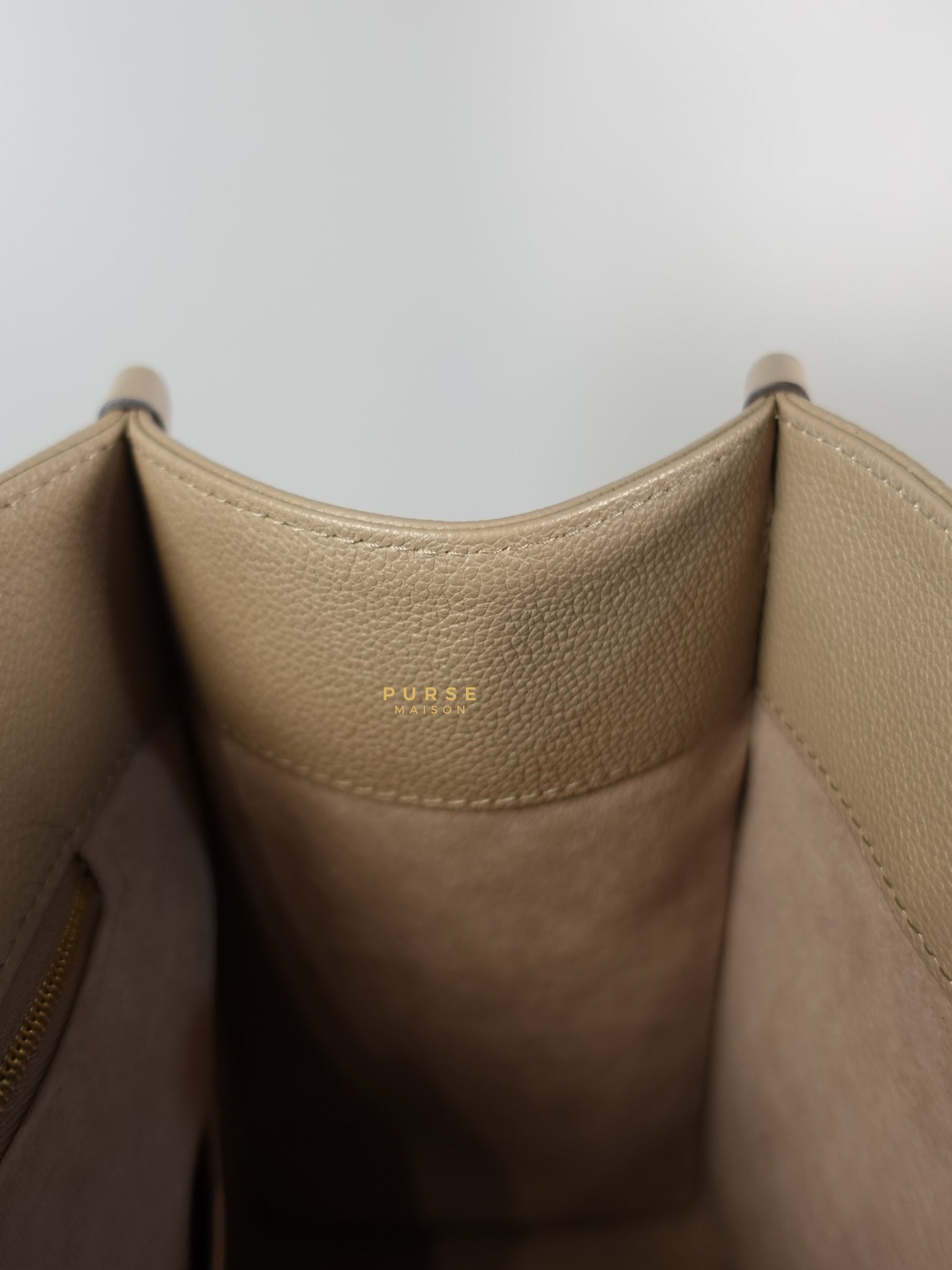 OnTheGo MM Tourterelle Empreinte Leather | Purse Maison Luxury Bags Shop