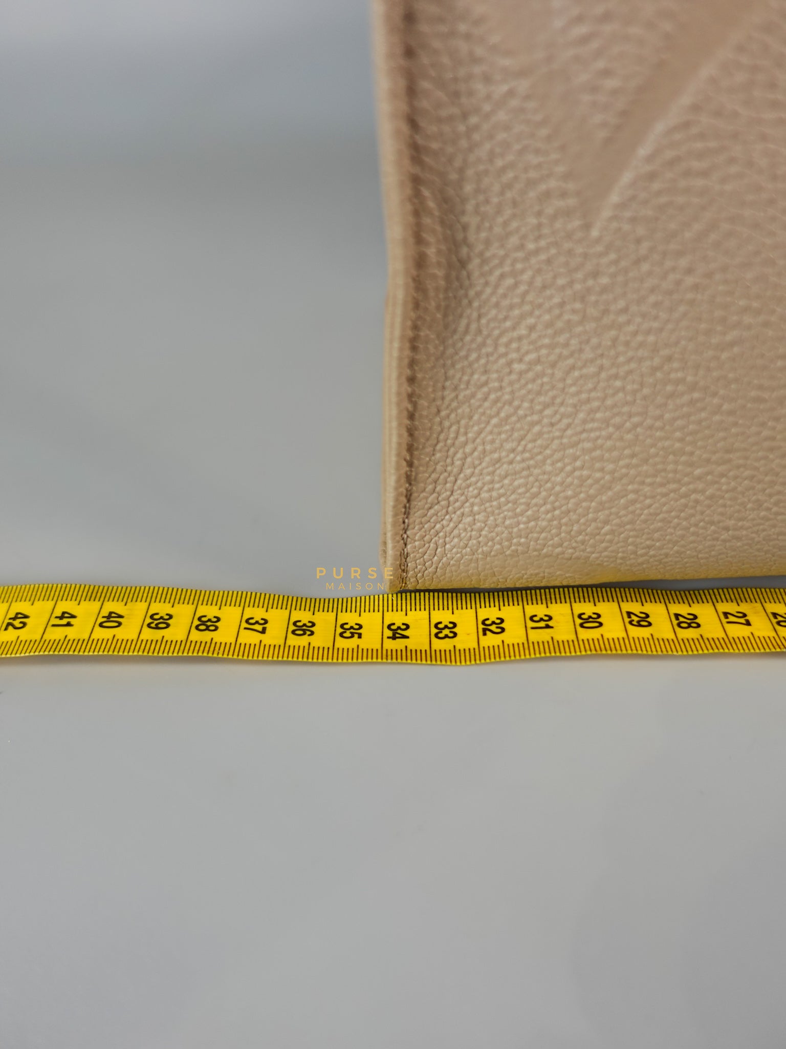 OnTheGo MM Tourterelle Empreinte Leather | Purse Maison Luxury Bags Shop