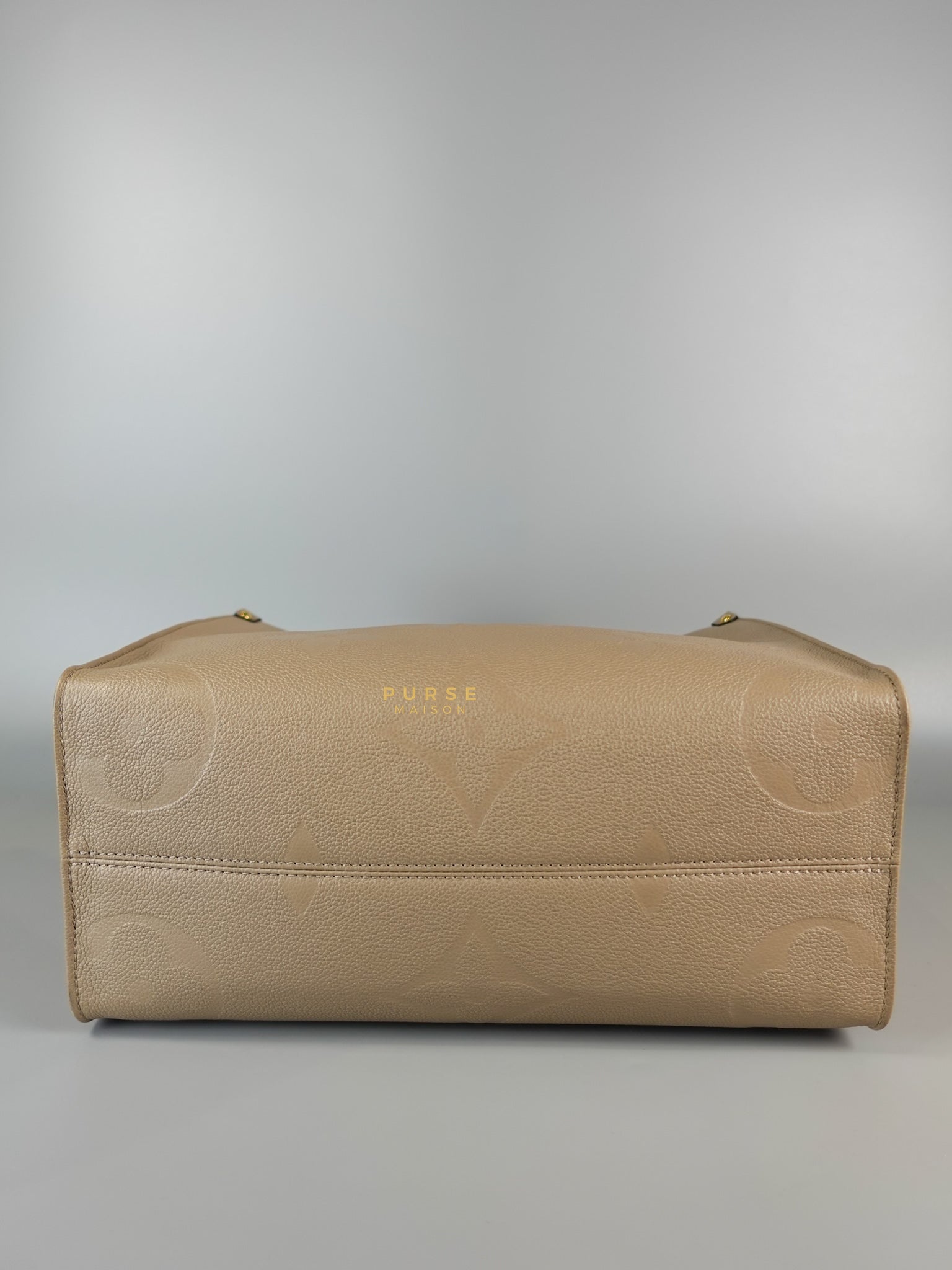 OnTheGo MM Tourterelle Empreinte Leather | Purse Maison Luxury Bags Shop