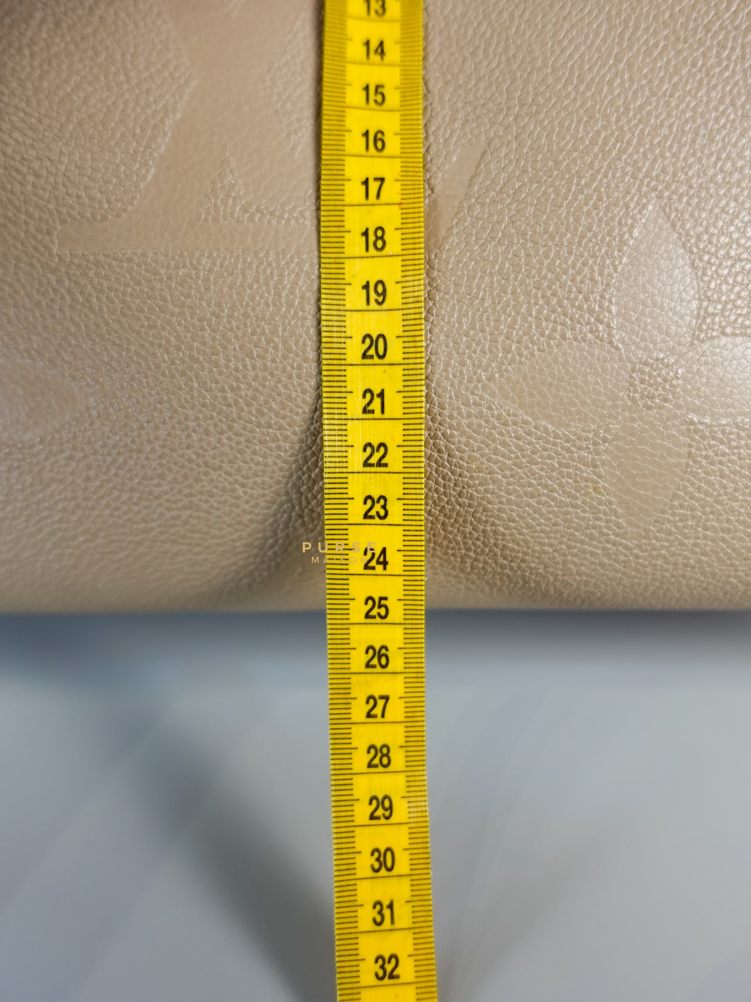 OnTheGo MM Tourterelle Empreinte Leather | Purse Maison Luxury Bags Shop