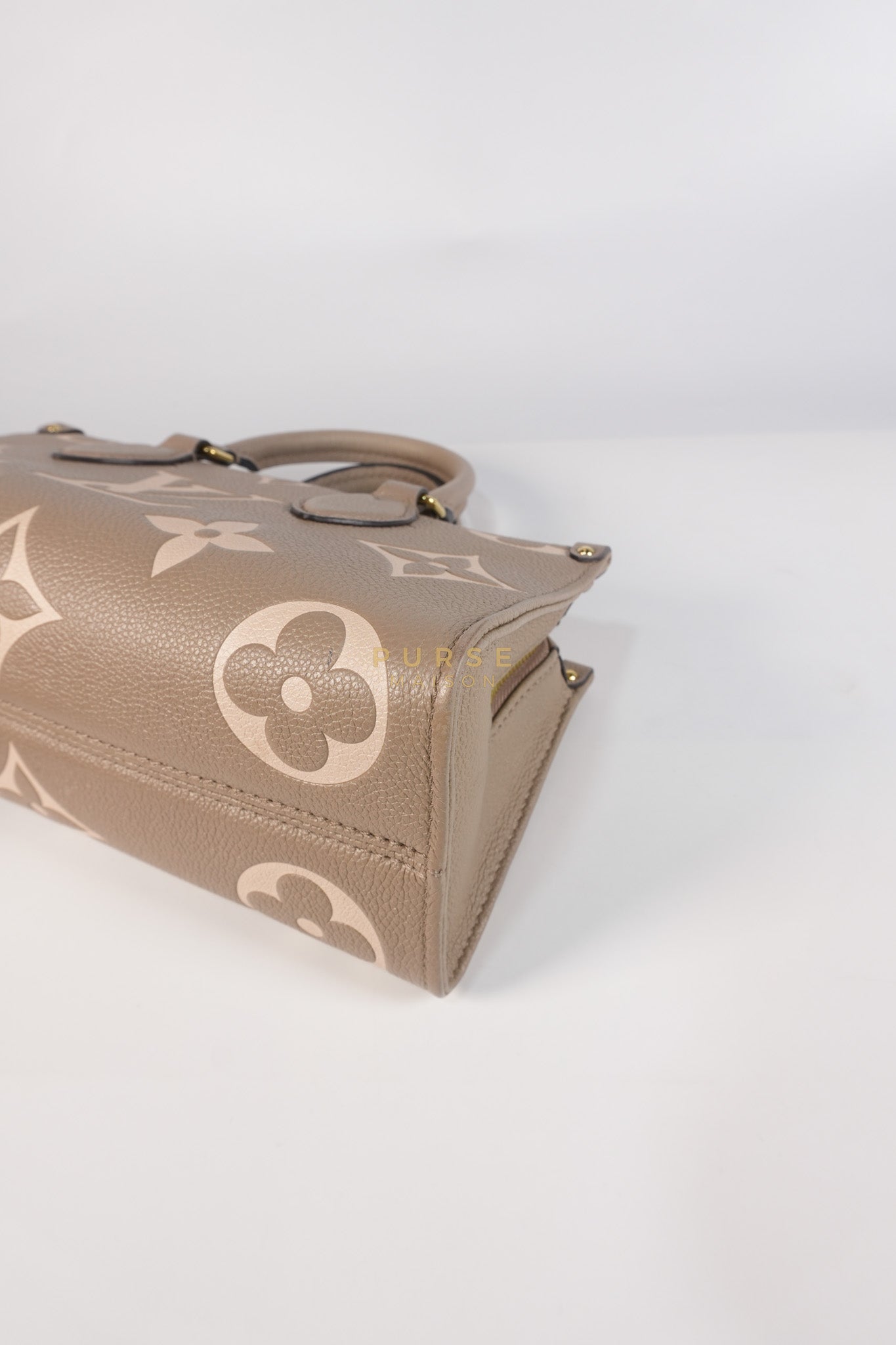 OnTheGo (OTG) East West Bi-color Empriente Leather (Microchip) | Purse Maison Luxury Bags Shop