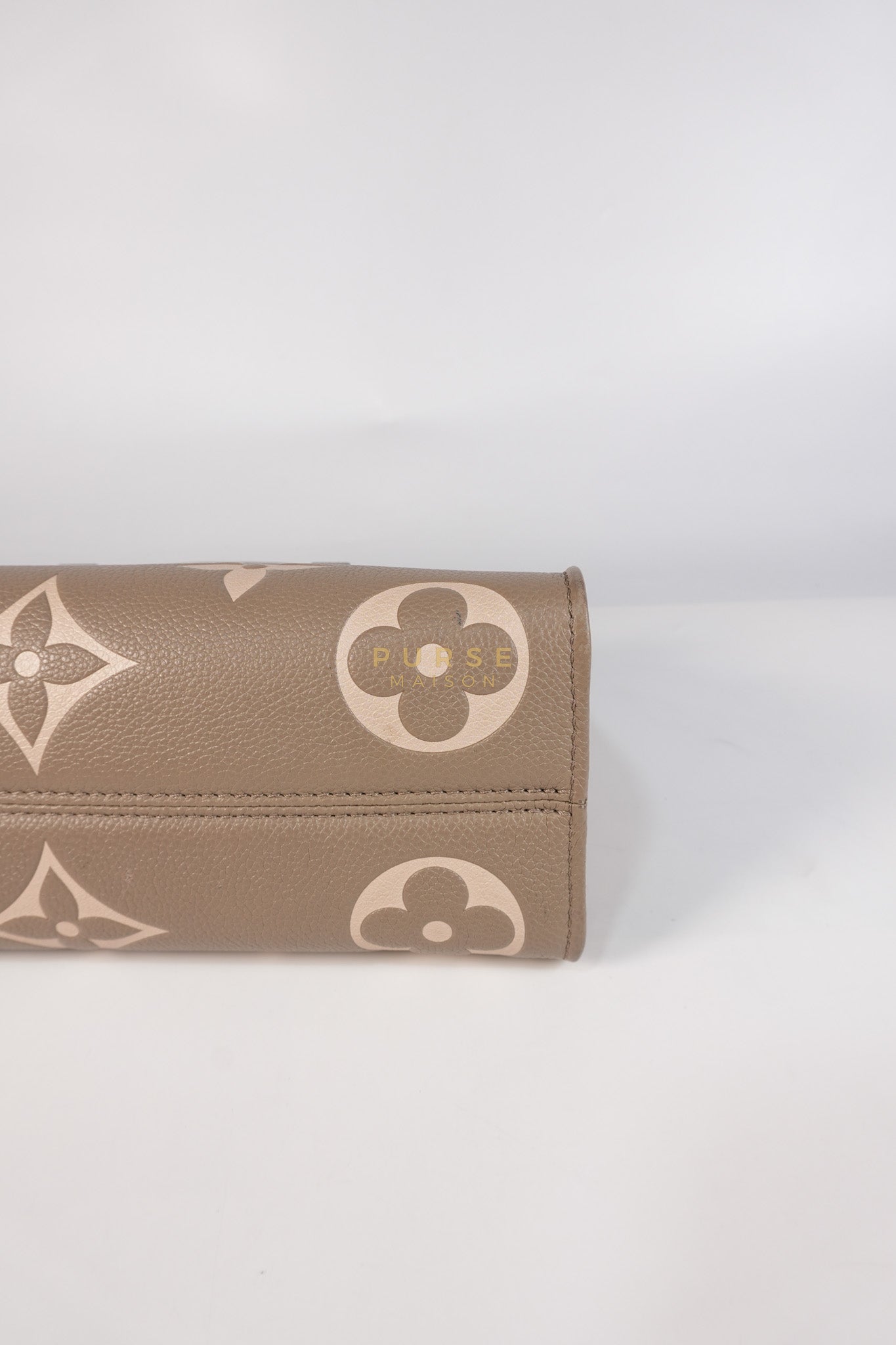 OnTheGo (OTG) East West Bi-color Empriente Leather (Microchip) | Purse Maison Luxury Bags Shop