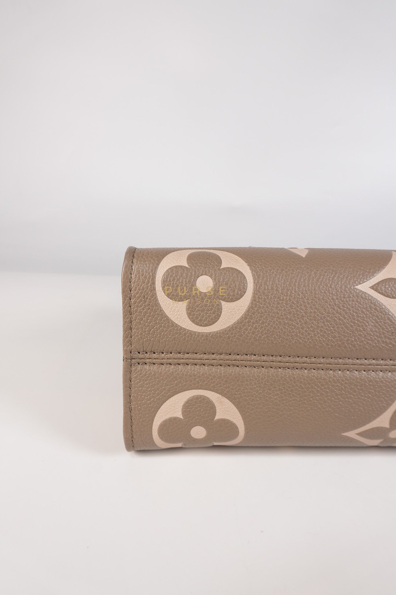 OnTheGo (OTG) East West Bi-color Empriente Leather (Microchip) | Purse Maison Luxury Bags Shop