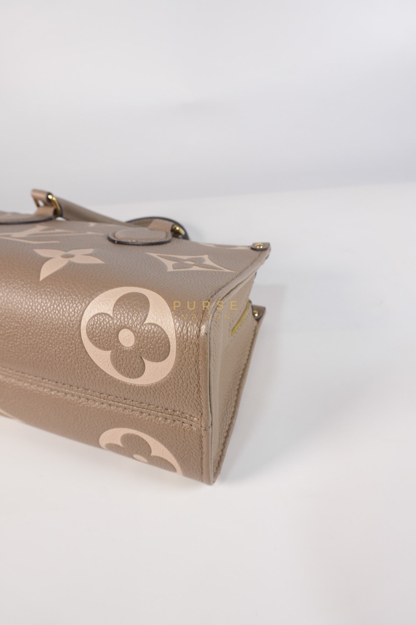 OnTheGo (OTG) East West Bi-color Empriente Leather (Microchip) | Purse Maison Luxury Bags Shop