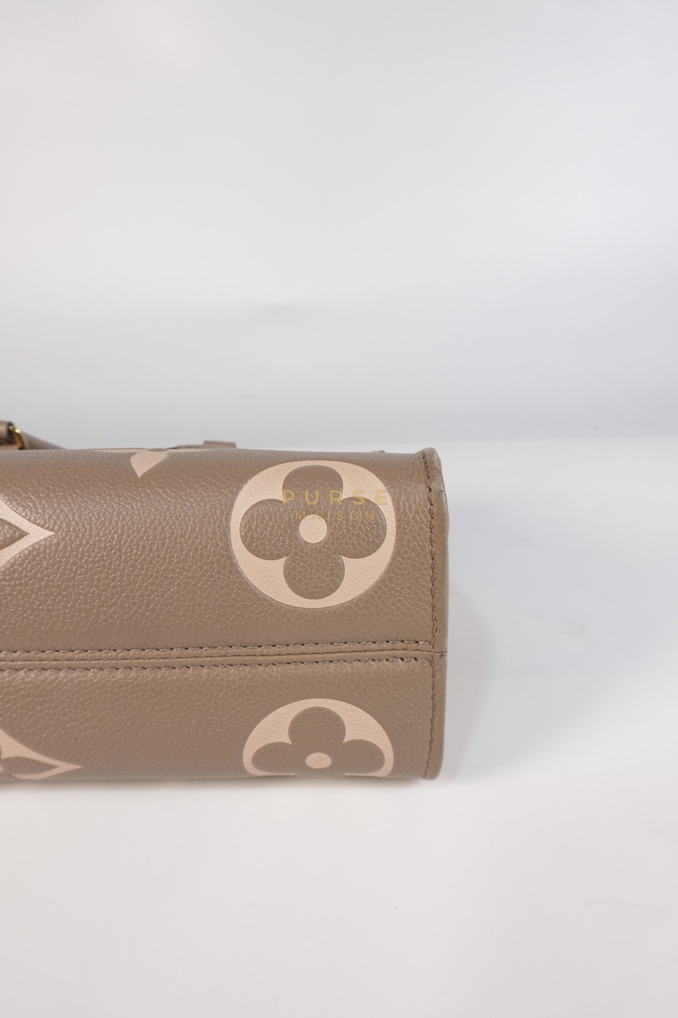 OnTheGo (OTG) East West Bi-color Empriente Leather (Microchip) | Purse Maison Luxury Bags Shop