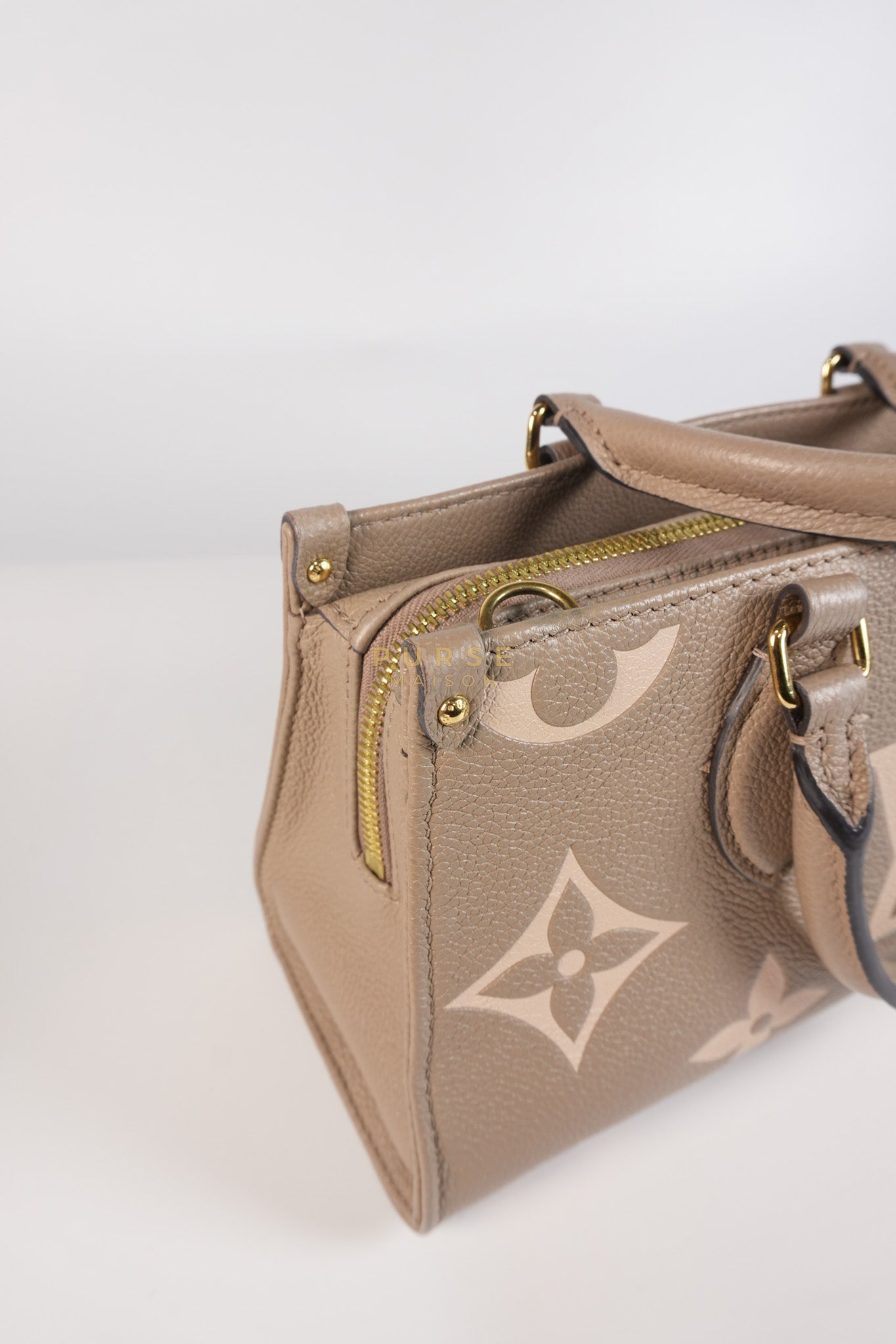 OnTheGo (OTG) East West Bi-color Empriente Leather (Microchip) | Purse Maison Luxury Bags Shop