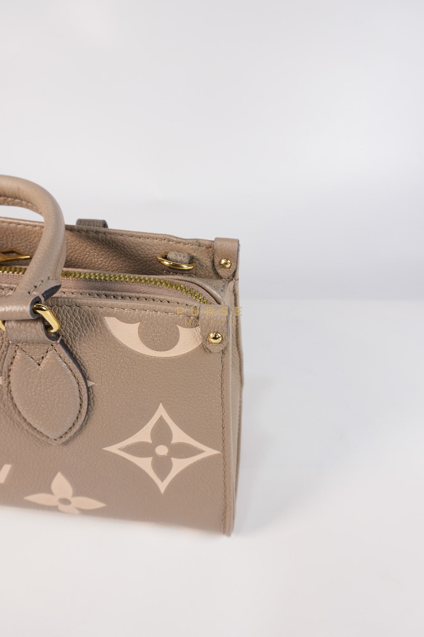 OnTheGo (OTG) East West Bi-color Empriente Leather (Microchip) | Purse Maison Luxury Bags Shop