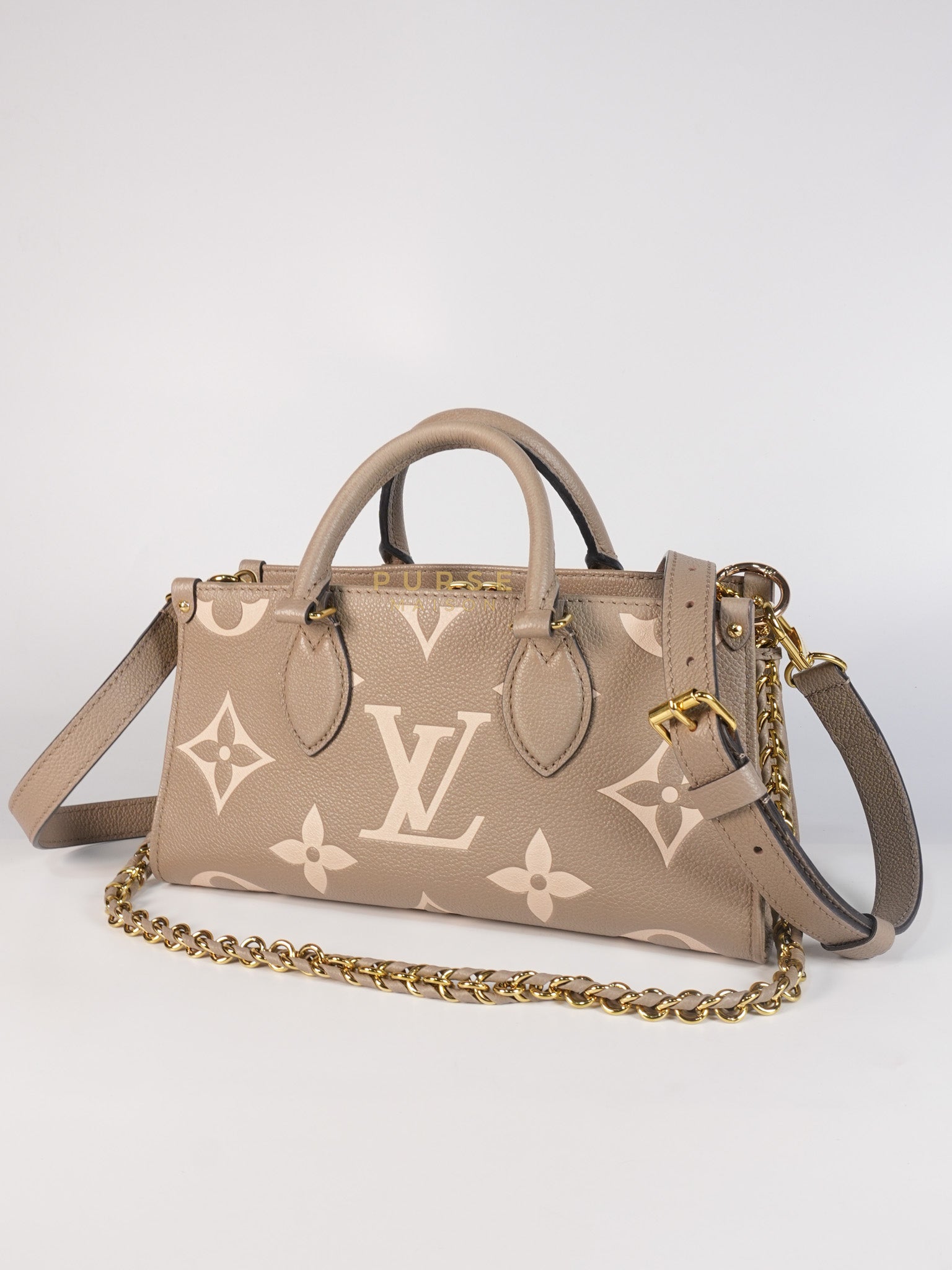 OnTheGo (OTG) East West Bi-color Empriente Leather (Microchip) | Purse Maison Luxury Bags Shop