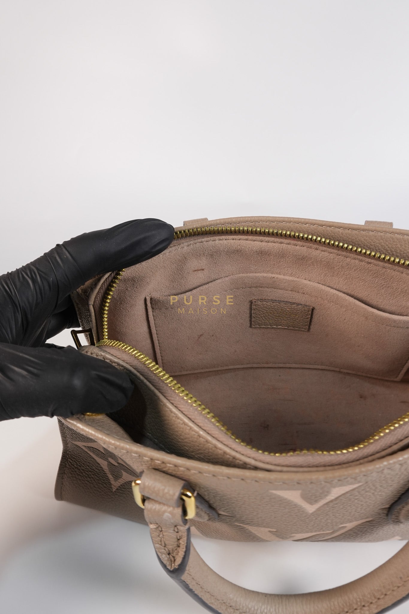 OnTheGo (OTG) East West Bi-color Empriente Leather (Microchip) | Purse Maison Luxury Bags Shop