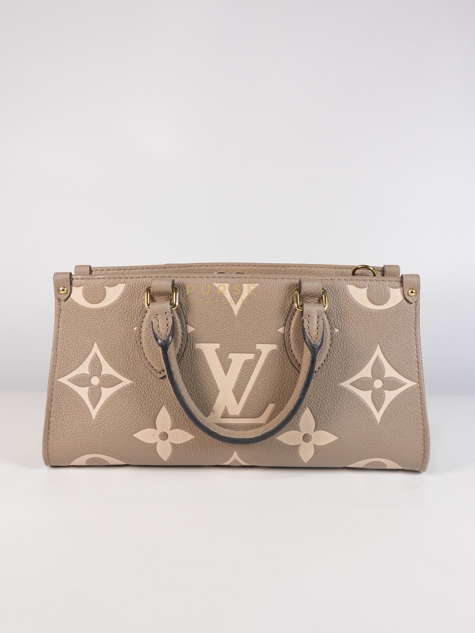 OnTheGo (OTG) East West Bi-color Empriente Leather (Microchip) | Purse Maison Luxury Bags Shop