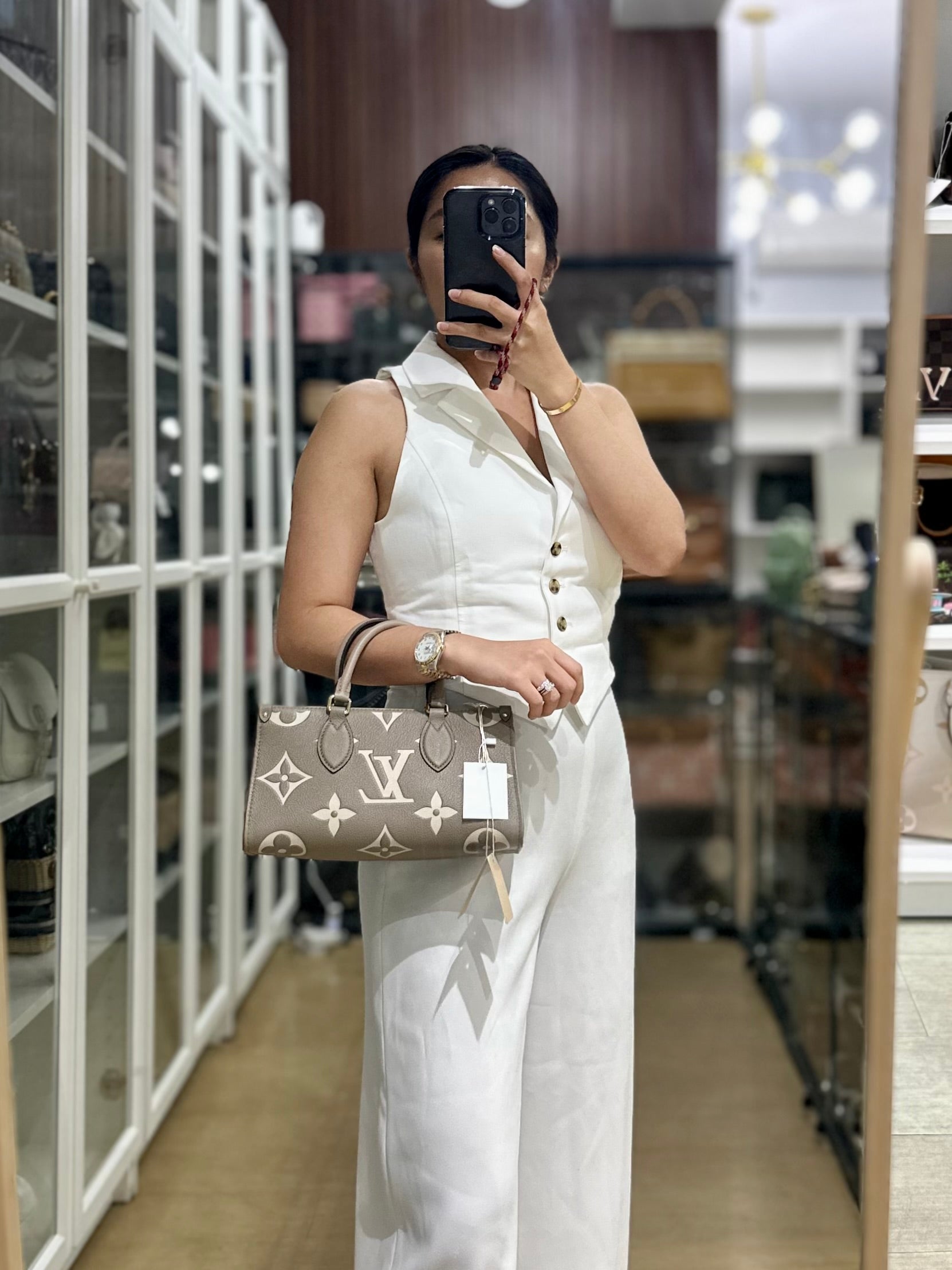 OnTheGo (OTG) East West Bi-color Empriente Leather (Microchip) | Purse Maison Luxury Bags Shop