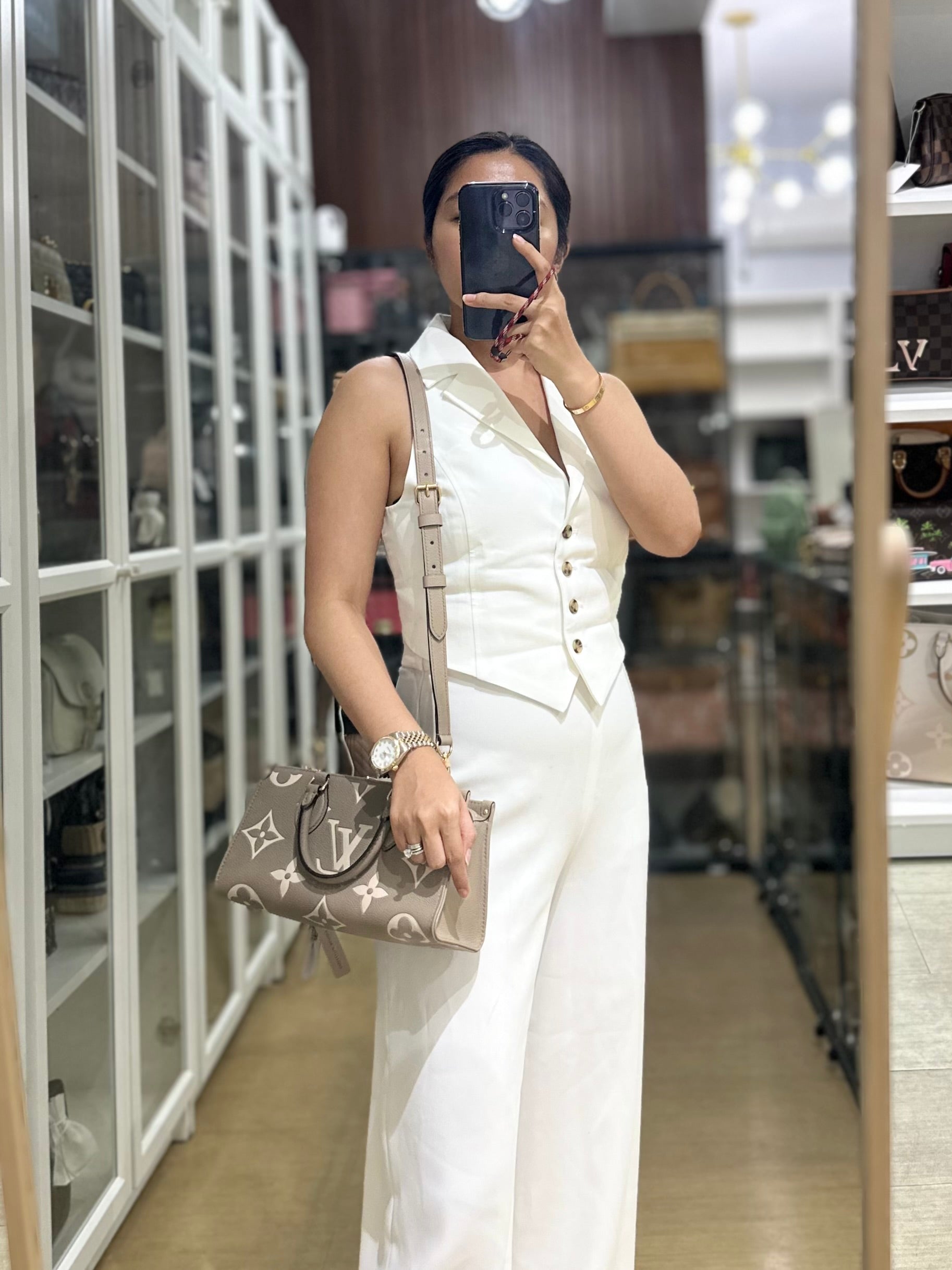 OnTheGo (OTG) East West Bi-color Empriente Leather (Microchip) | Purse Maison Luxury Bags Shop