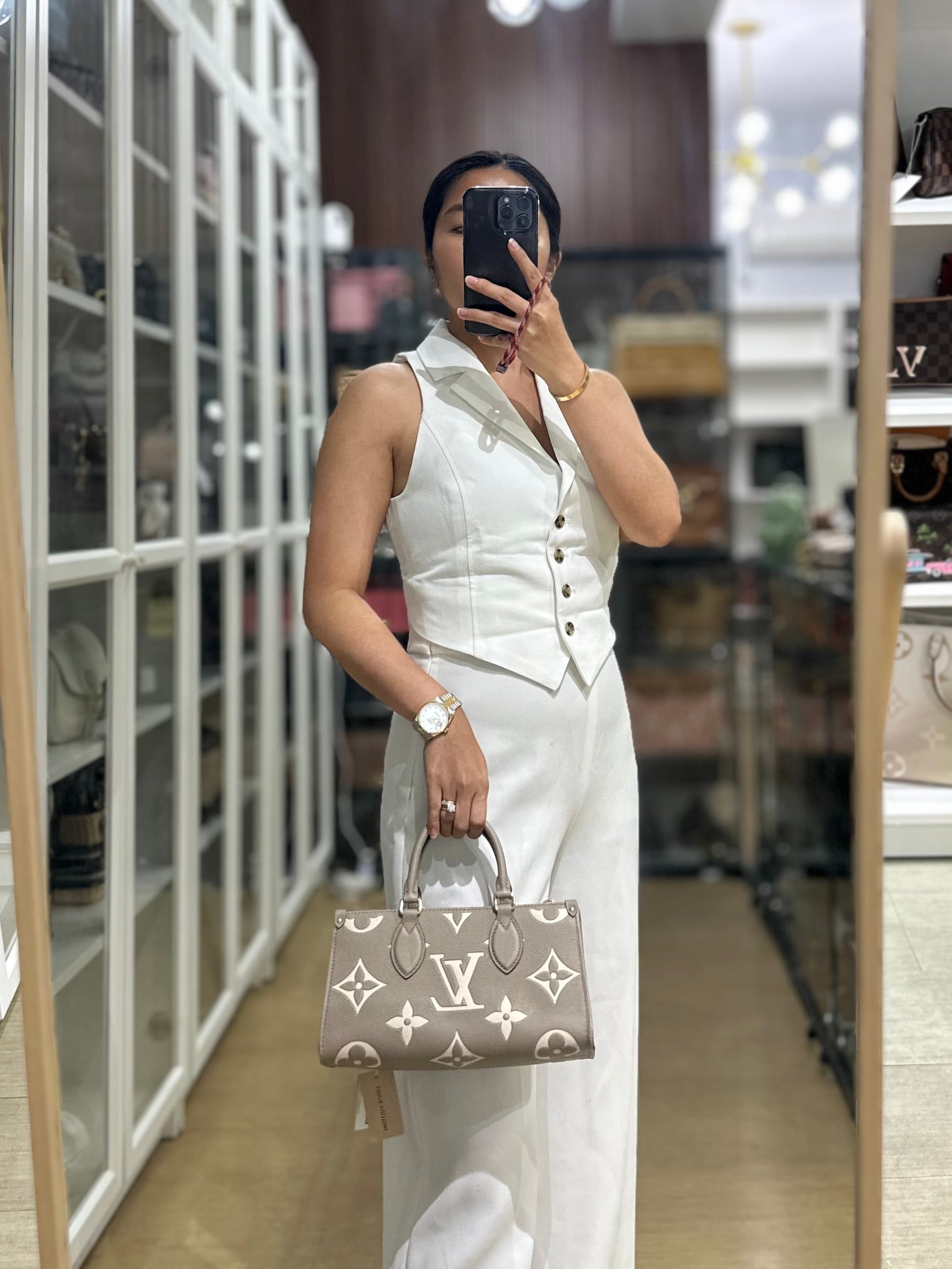 OnTheGo (OTG) East West Bi-color Empriente Leather (Microchip) | Purse Maison Luxury Bags Shop