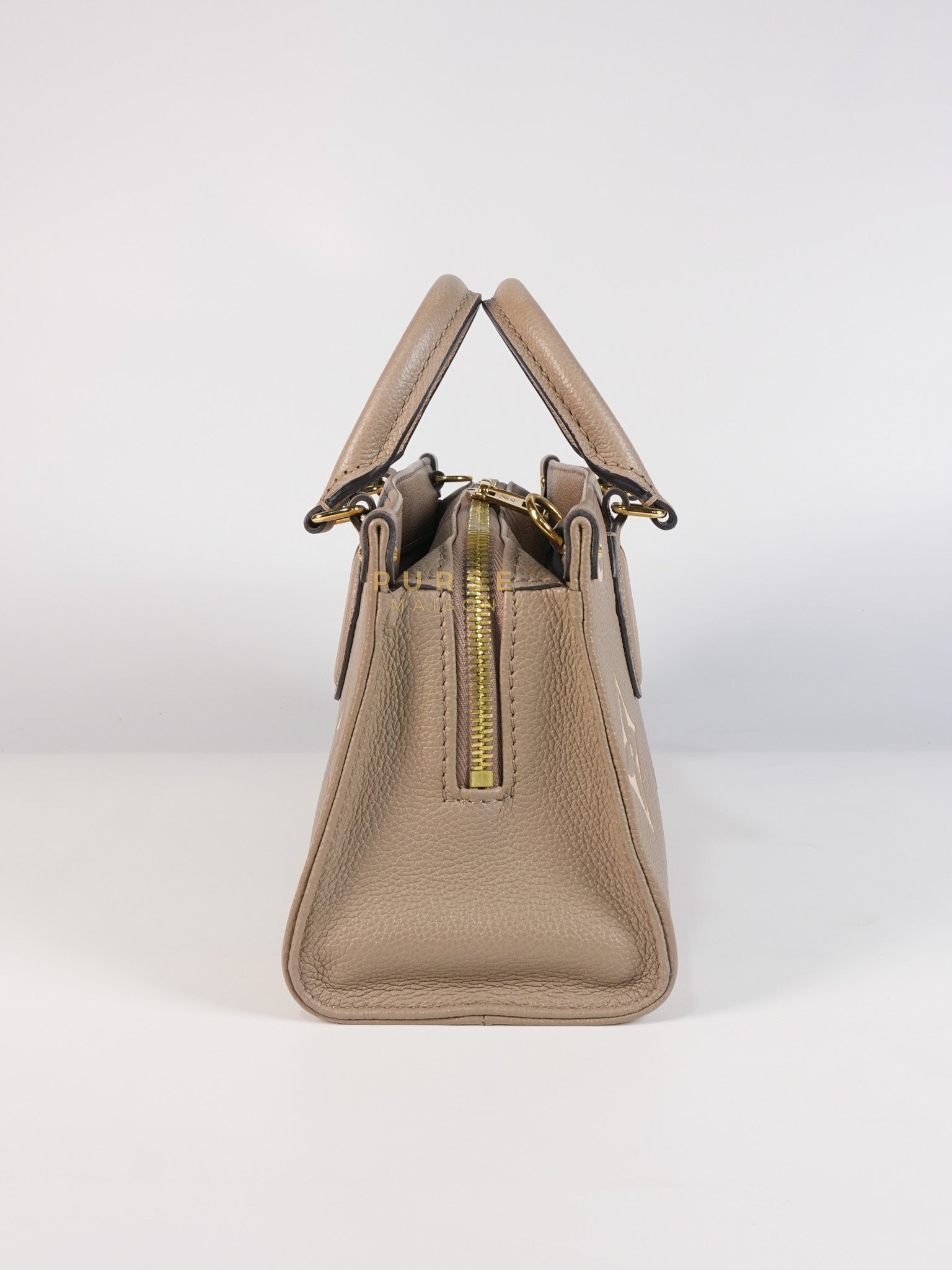 OnTheGo (OTG) East West Bi-color Empriente Leather (Microchip) | Purse Maison Luxury Bags Shop