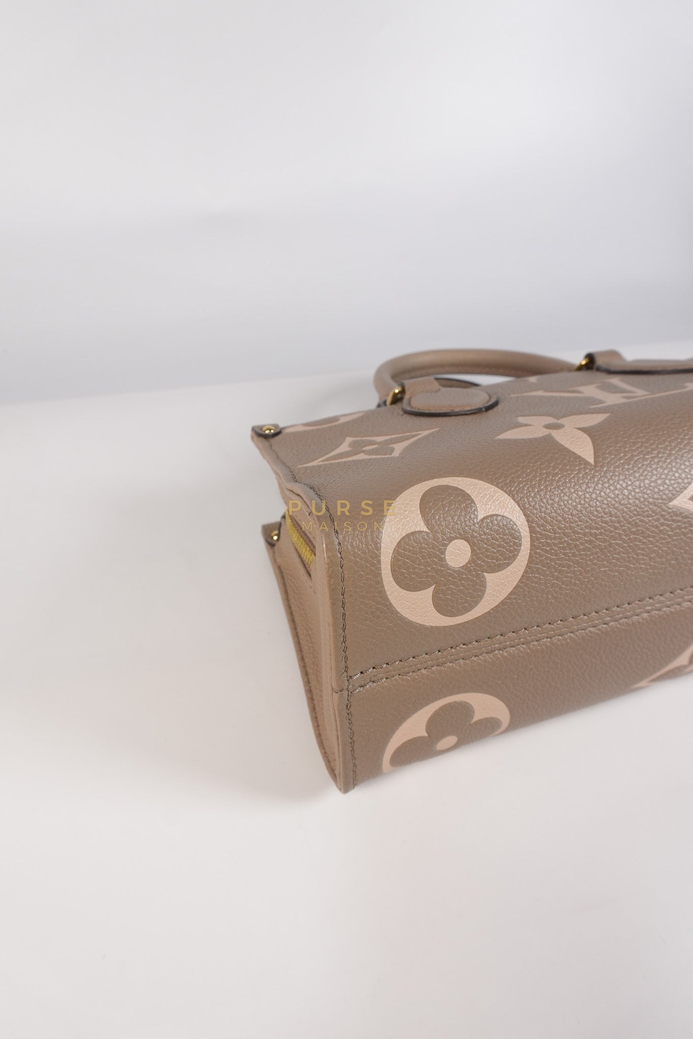 OnTheGo (OTG) East West Bi-color Empriente Leather (Microchip) | Purse Maison Luxury Bags Shop