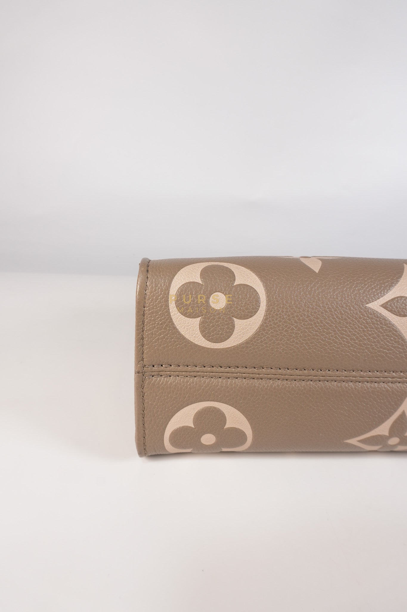 OnTheGo (OTG) East West Bi-color Empriente Leather (Microchip) | Purse Maison Luxury Bags Shop