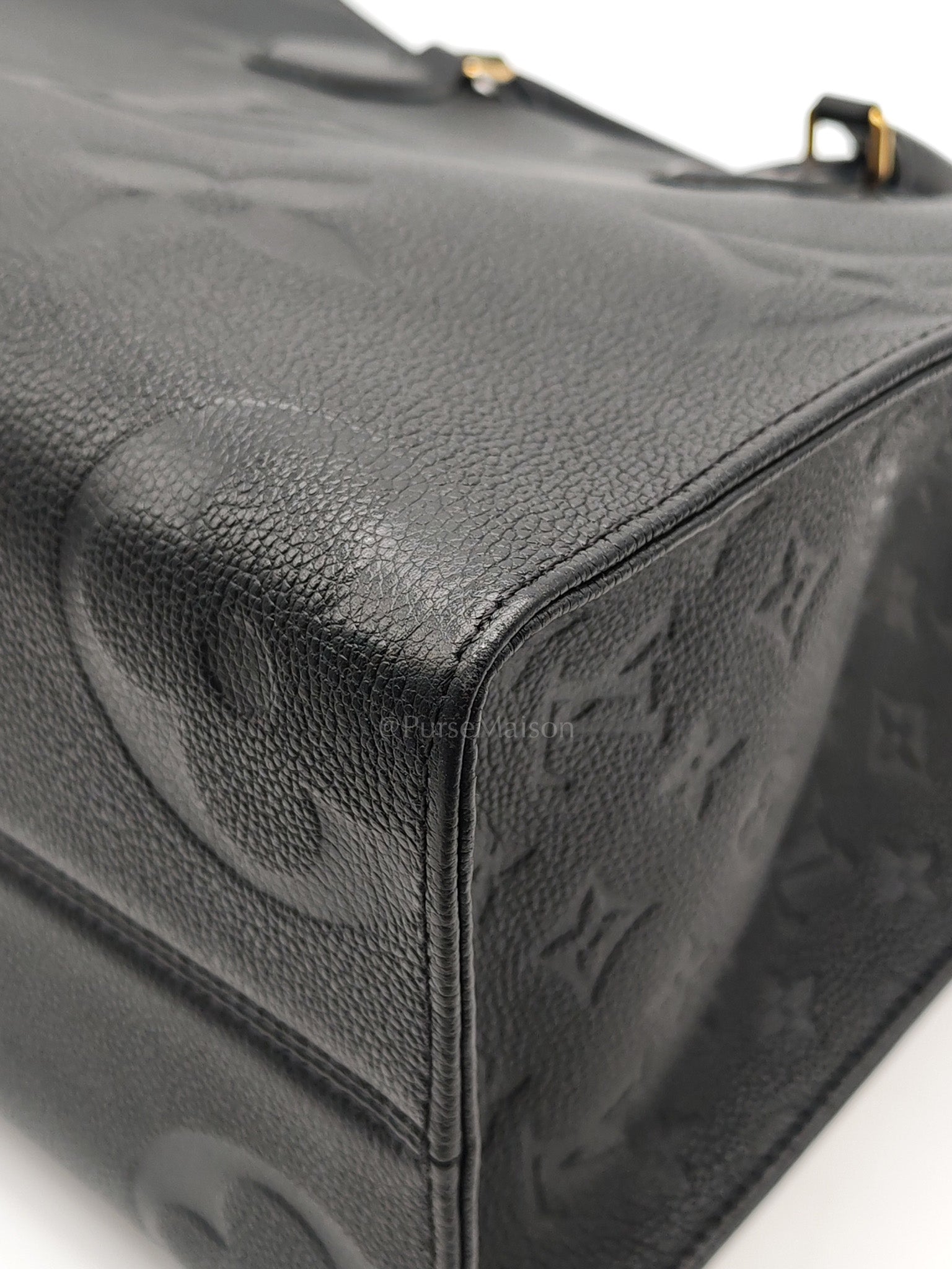 OnTheGo (OTG) MM in Black Monogram Empreinte Leather & Gold Hardware Microchip | Purse Maison Luxury Bags Shop
