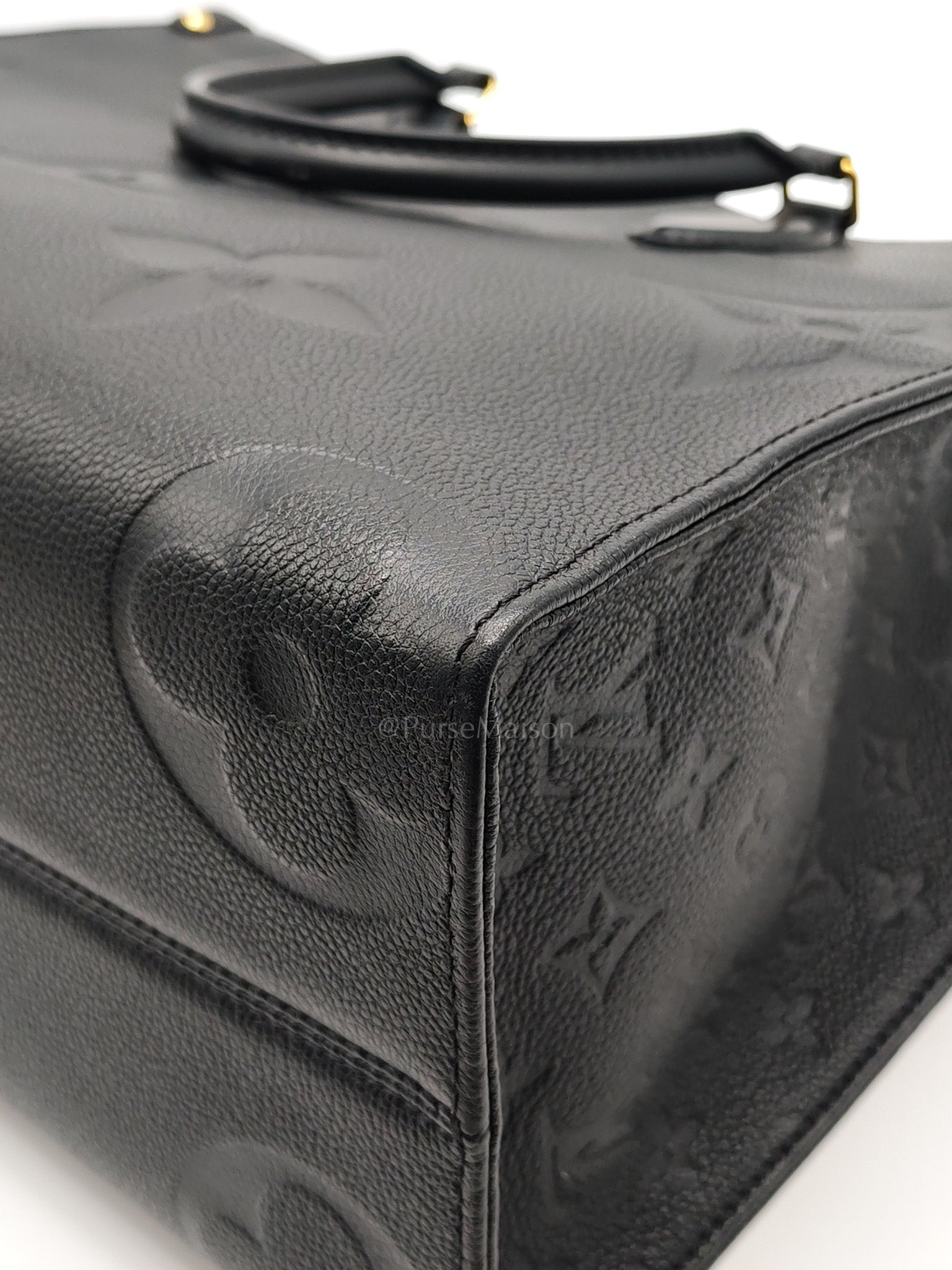 OnTheGo (OTG) MM in Black Monogram Empreinte Leather & Gold Hardware Microchip | Purse Maison Luxury Bags Shop