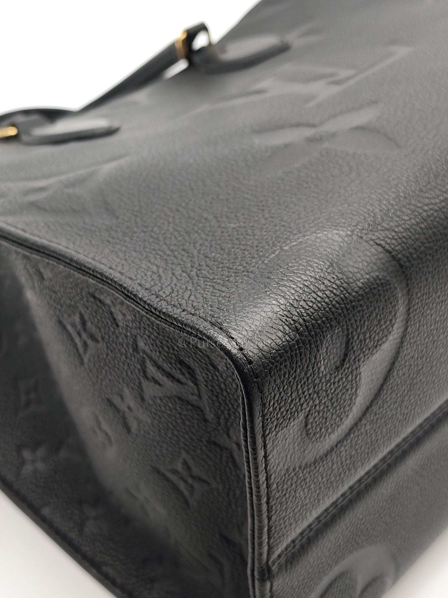 OnTheGo (OTG) MM in Black Monogram Empreinte Leather & Gold Hardware Microchip | Purse Maison Luxury Bags Shop