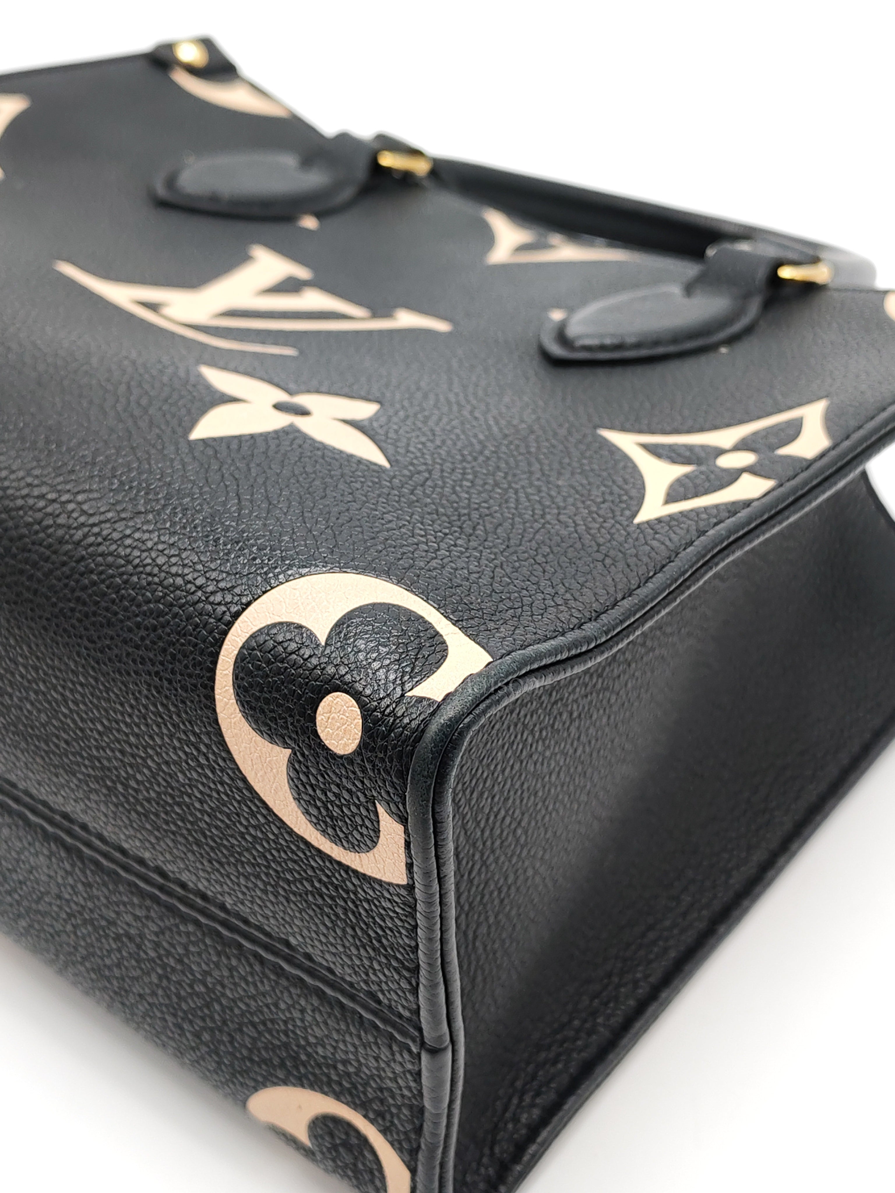 OnTheGo (OTG) PM in Bicolor Black/Creme Monogram Giant Empreinte & Gold Hardware Microchip | Purse Maison Luxury Bags Shop