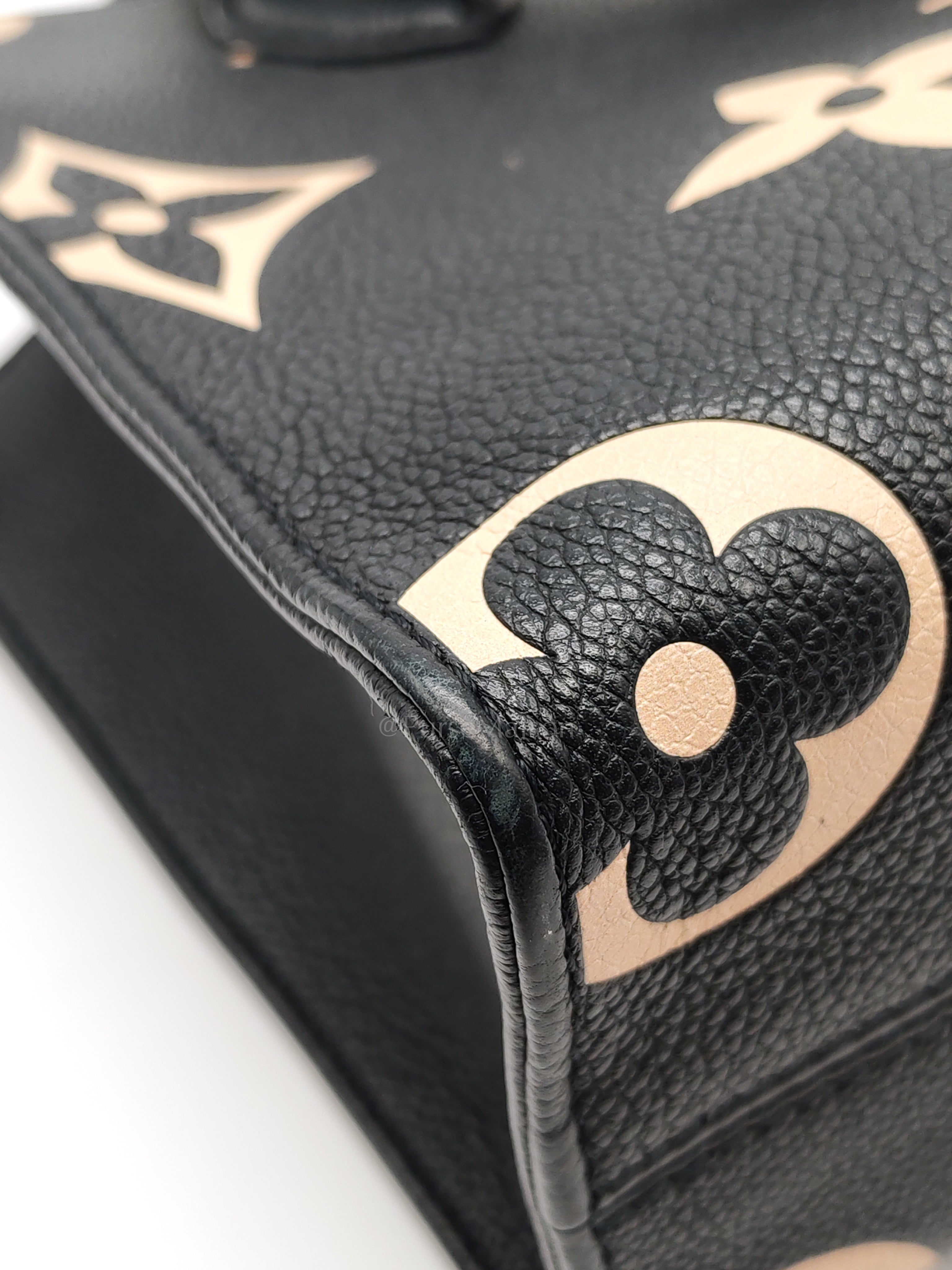 OnTheGo (OTG) PM in Bicolor Black/Creme Monogram Giant Empreinte & Gold Hardware Microchip | Purse Maison Luxury Bags Shop