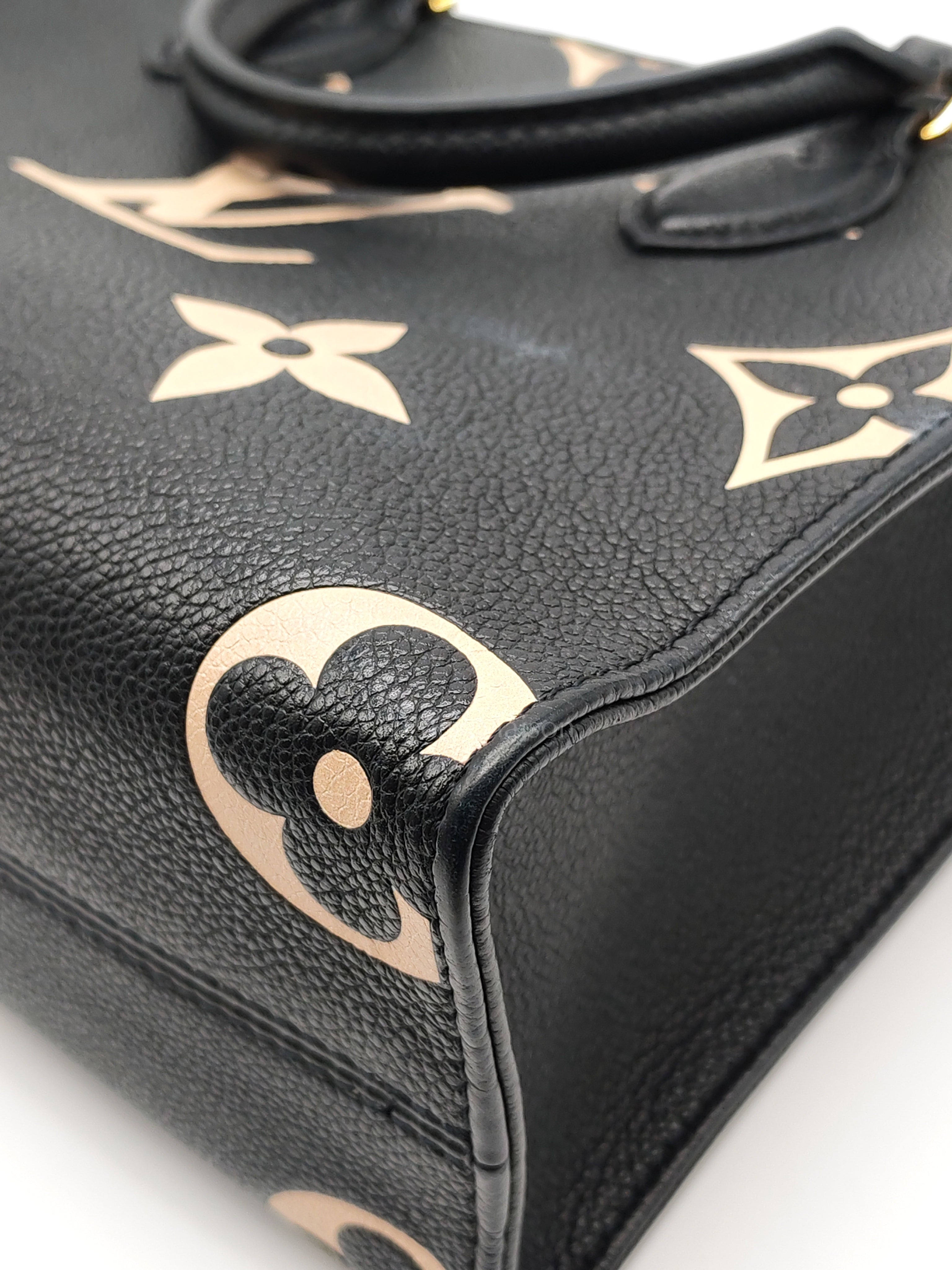 OnTheGo (OTG) PM in Bicolor Black/Creme Monogram Giant Empreinte & Gold Hardware Microchip | Purse Maison Luxury Bags Shop