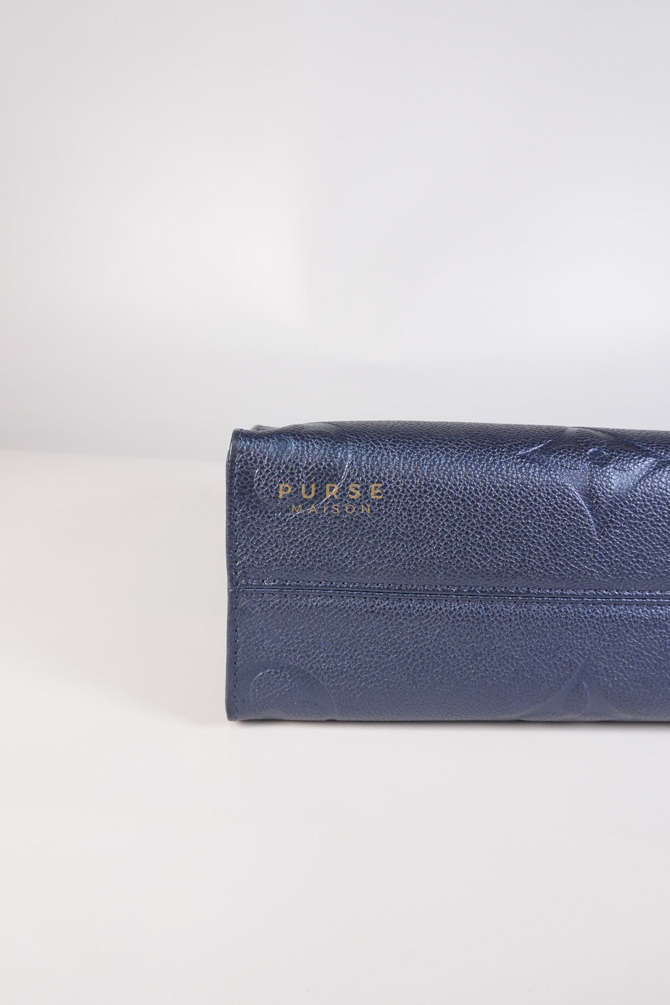 OnTheGo (OTG) PM Navy Nacre Metallic Empreinte Giant Monogram (Microchip) | Purse Maison Luxury Bags Shop