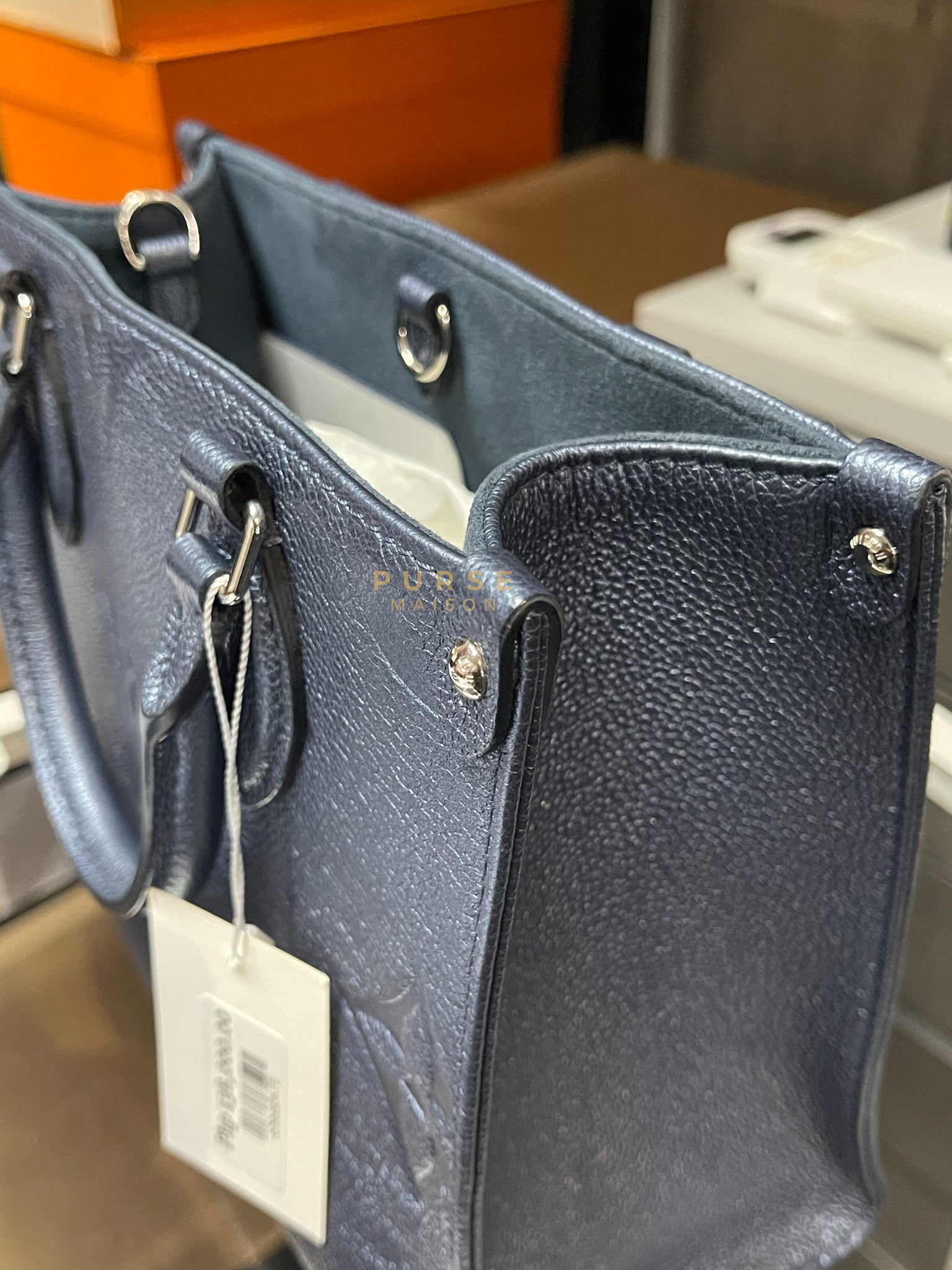 OnTheGo (OTG) PM Navy Nacre Metallic Empreinte Giant Monogram (Microchip) | Purse Maison Luxury Bags Shop