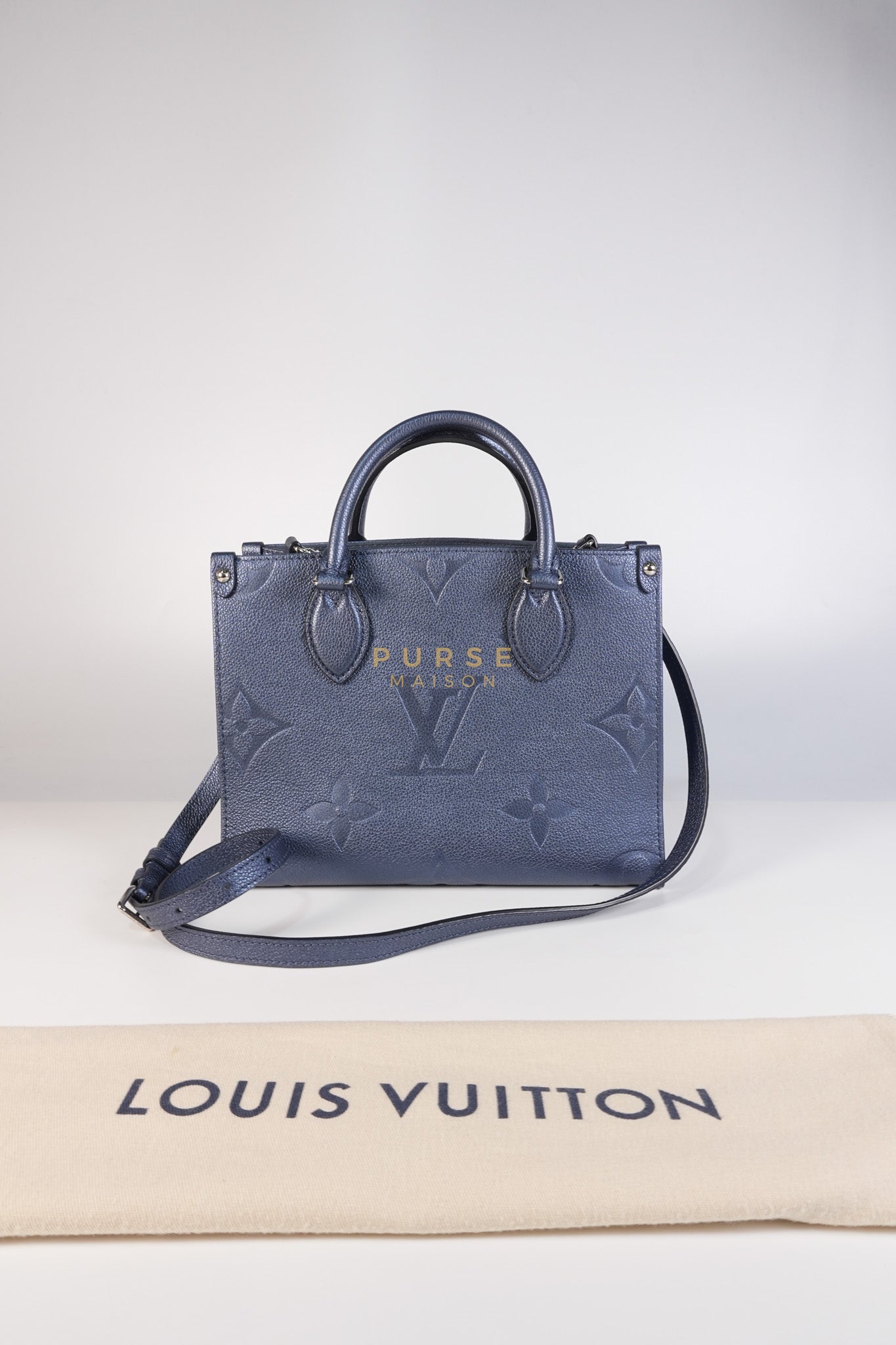 OnTheGo (OTG) PM Navy Nacre Metallic Empreinte Giant Monogram (Microchip) | Purse Maison Luxury Bags Shop