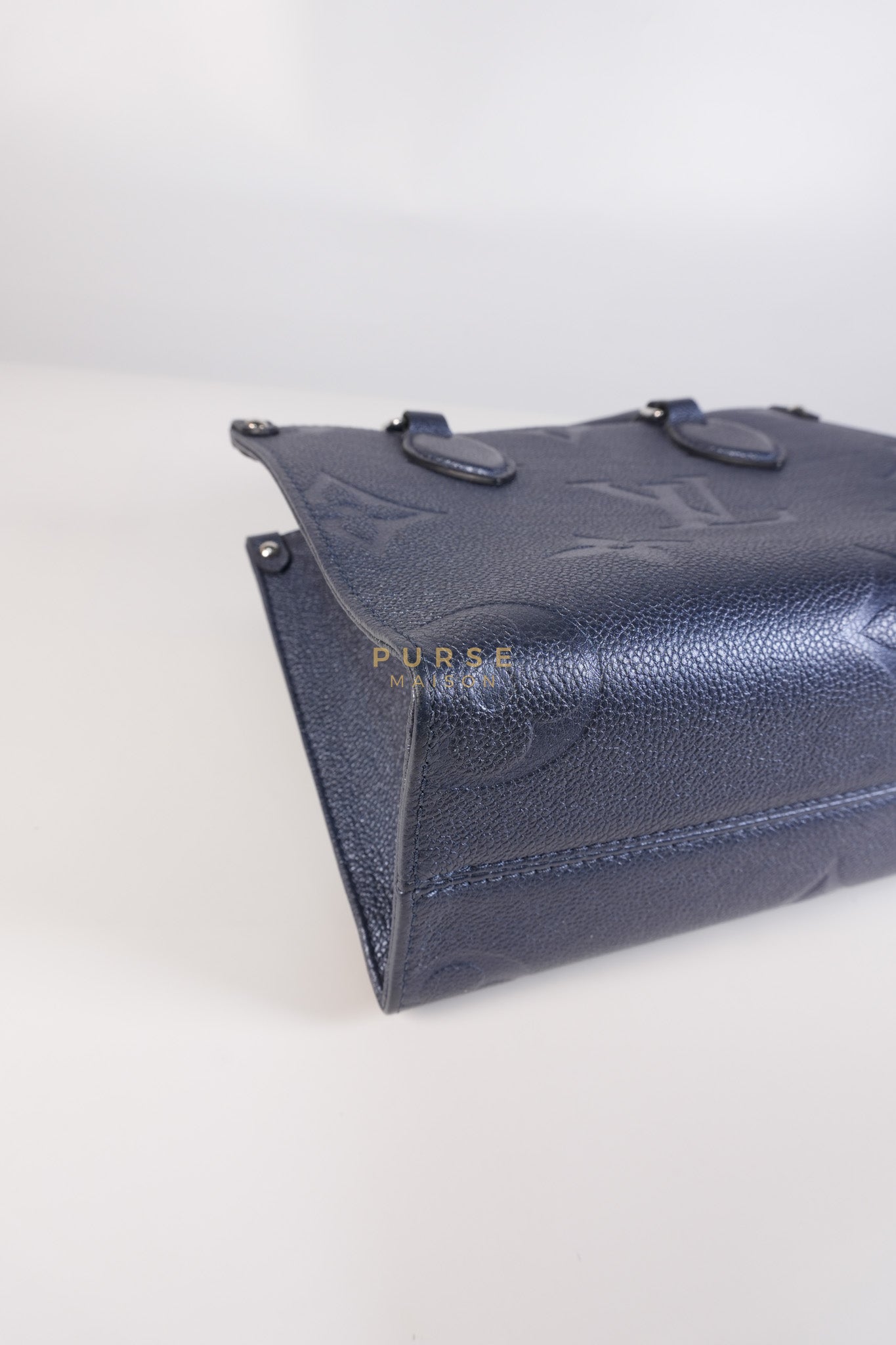OnTheGo (OTG) PM Navy Nacre Metallic Empreinte Giant Monogram (Microchip) | Purse Maison Luxury Bags Shop