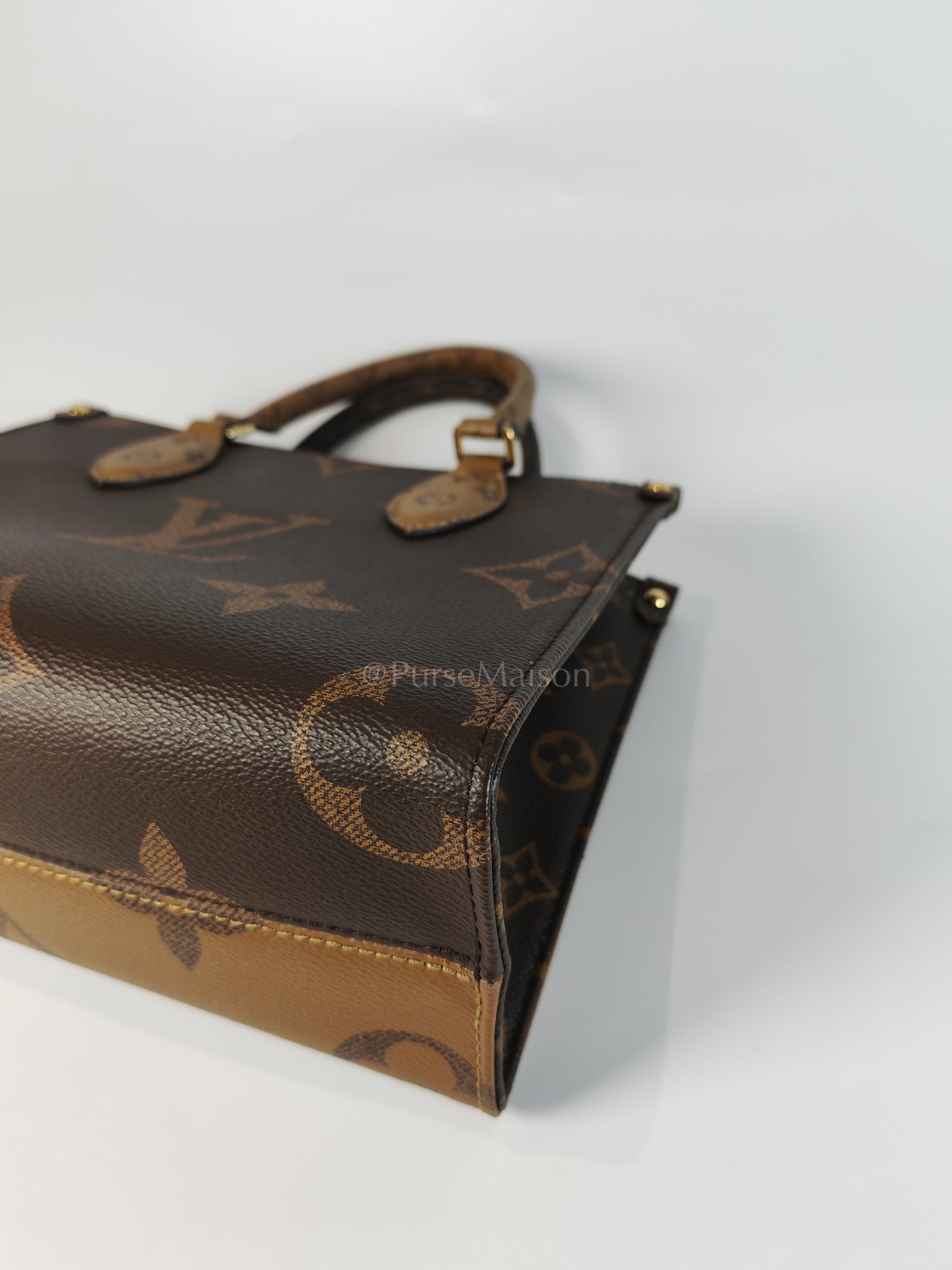 OnTheGo PM (OTG) in Reverse Monogram Canvas (Microchip) | Purse Maison Luxury Bags Shop