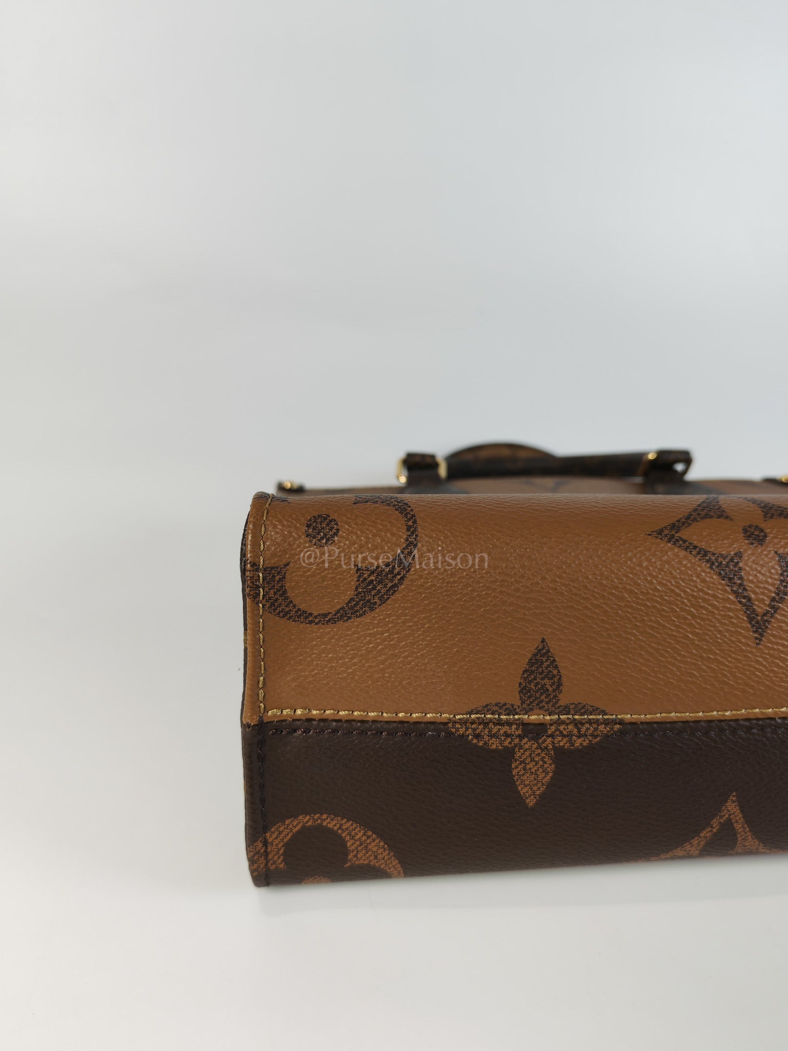 OnTheGo PM (OTG) in Reverse Monogram Canvas (Microchip) | Purse Maison Luxury Bags Shop