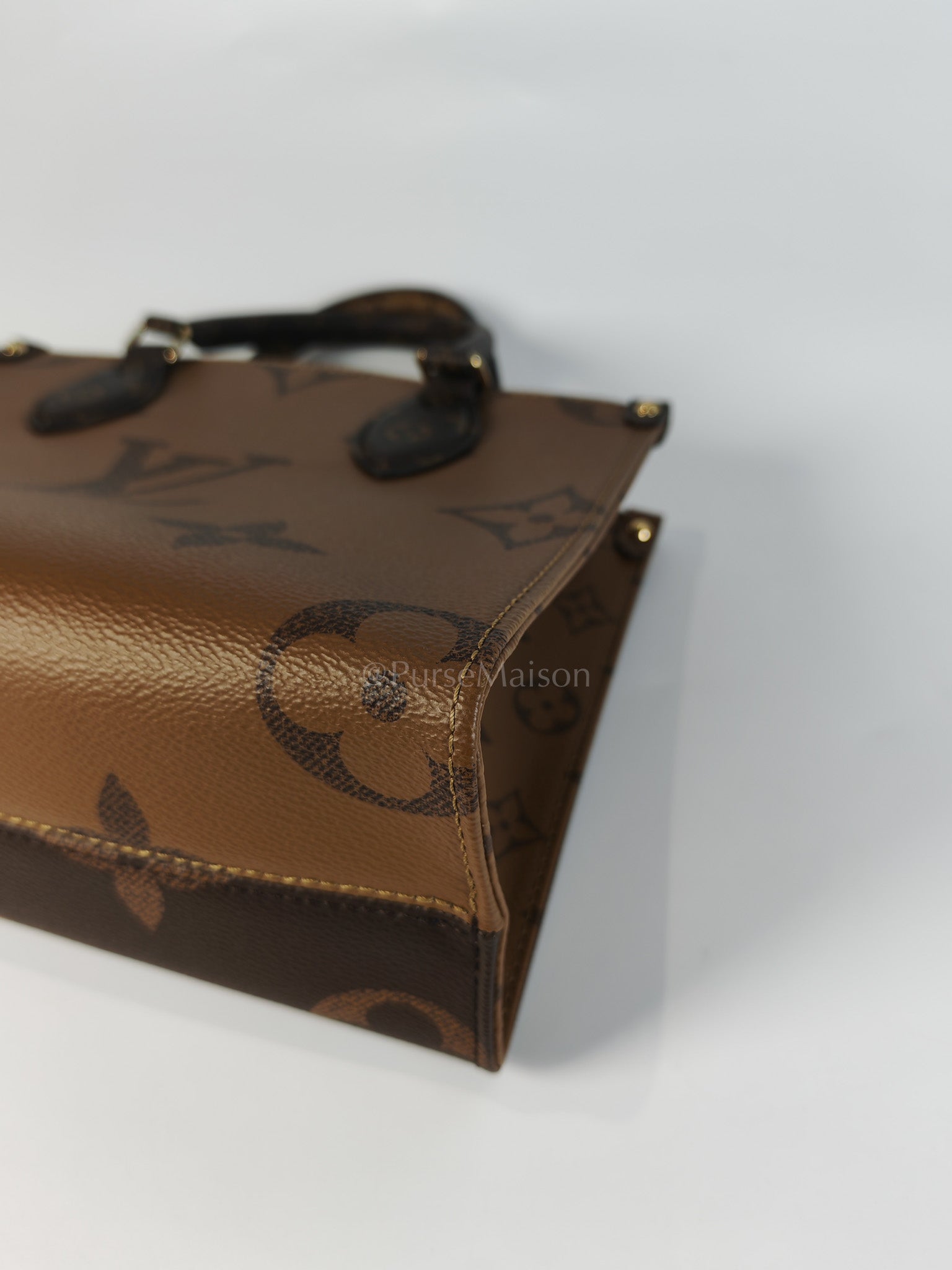 OnTheGo PM (OTG) in Reverse Monogram Canvas (Microchip) | Purse Maison Luxury Bags Shop