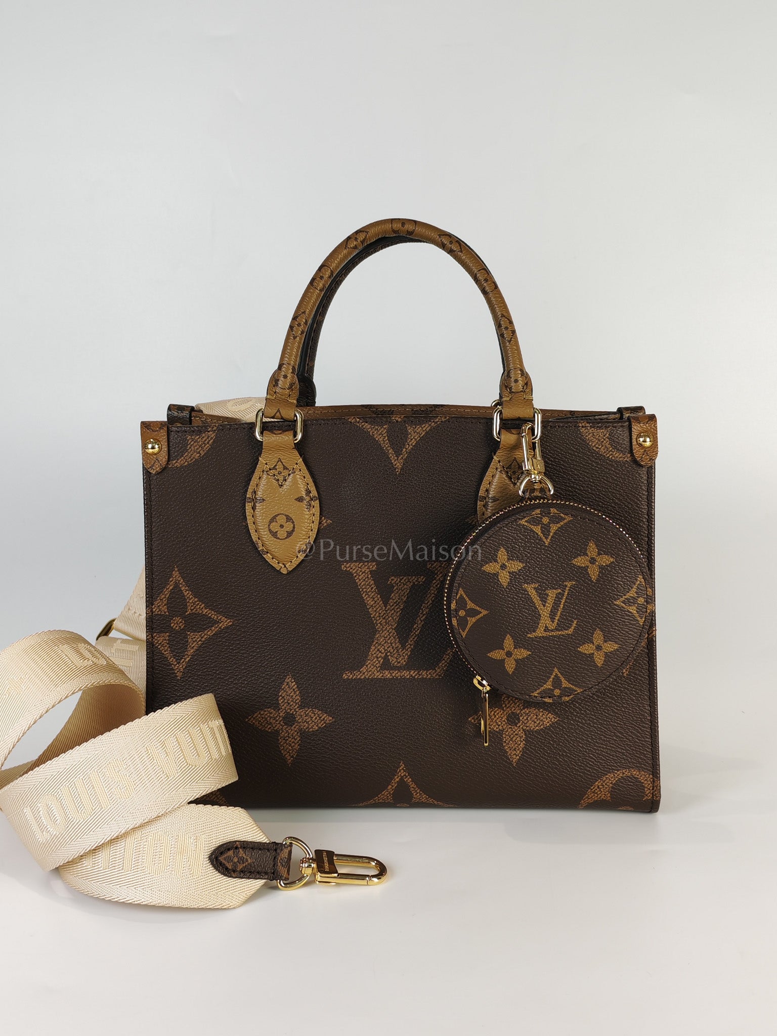 OnTheGo PM (OTG) in Reverse Monogram Canvas (Microchip) | Purse Maison Luxury Bags Shop