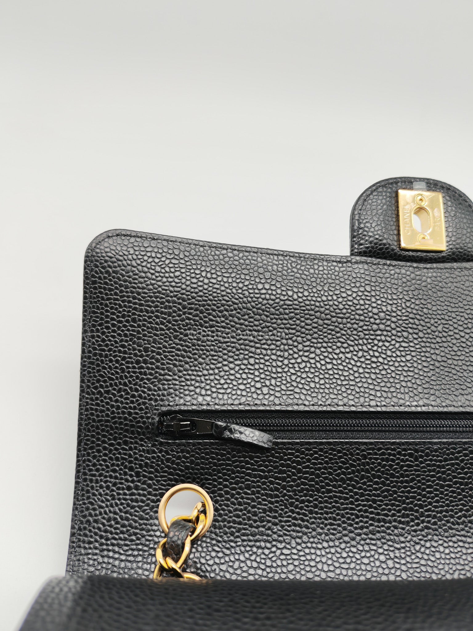 Classic Double Flap Bag Medium in Black Quilted Caviar Leather and Gold Hardware Microchip