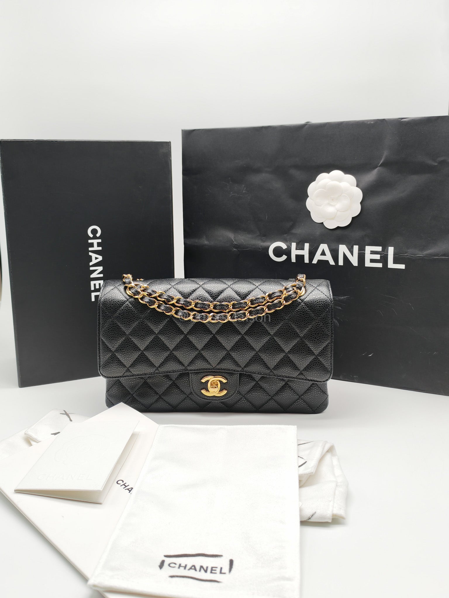 Classic Double Flap Bag Medium in Black Quilted Caviar Leather and Gold Hardware Microchip