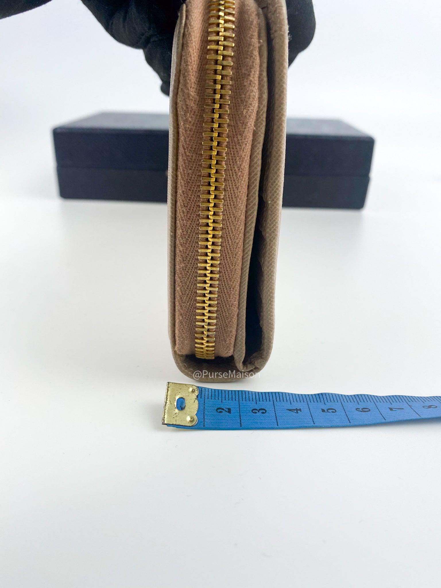 Prada 1M1348 Long Zipped Wallet in Beige Saffiano Metal Leather