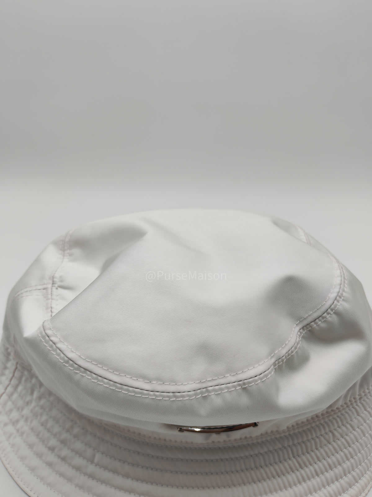Prada Re-Nylon Bucket Hat in White with Signature Enameled Metal Triangle Logo | Purse Maison Luxury Bags Shop
