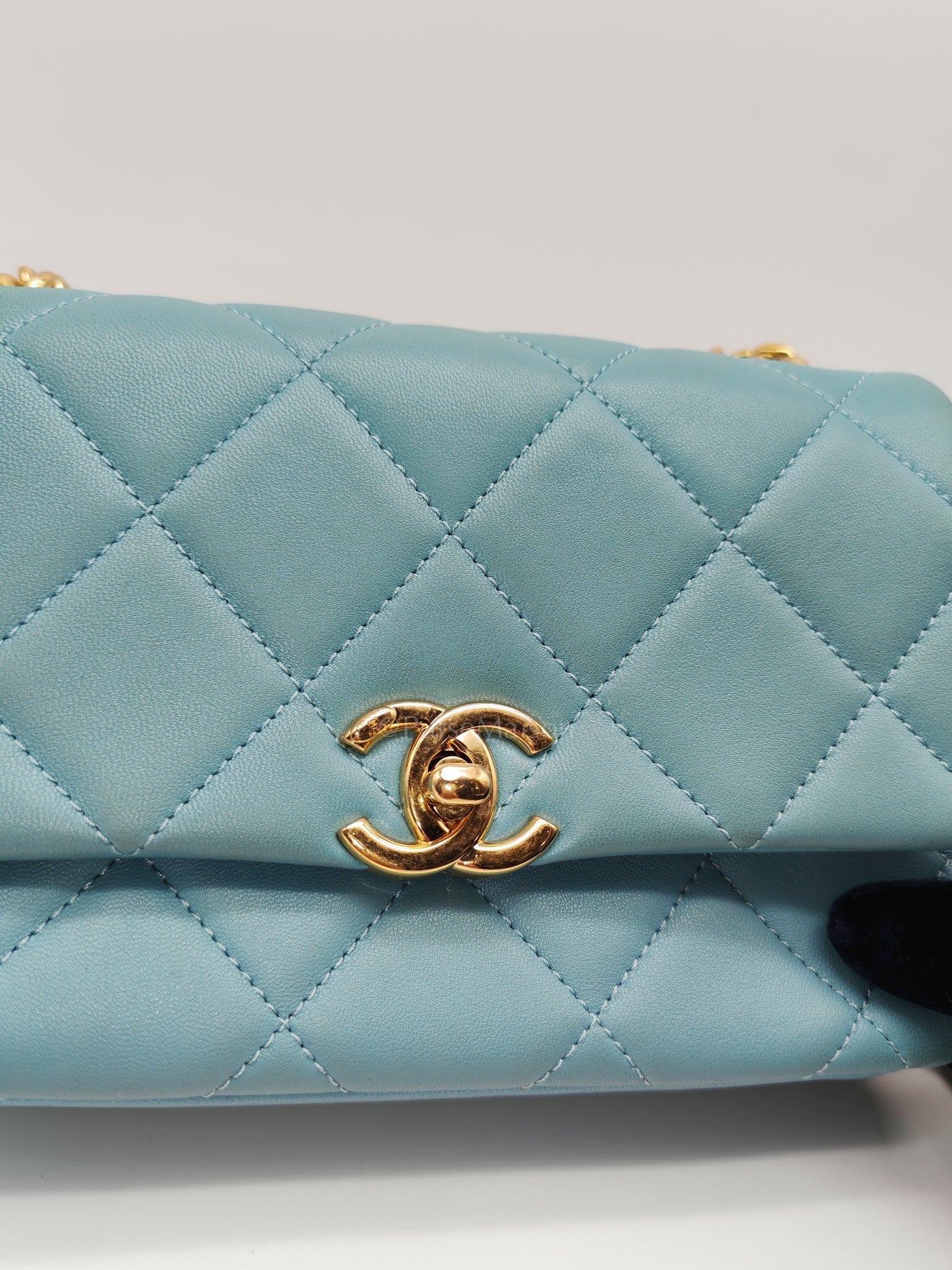 Mini CC Crystal Logo Chain Flap Bag in Light Blue Quilted Lambskin Leather & Gold Hardware Microchip