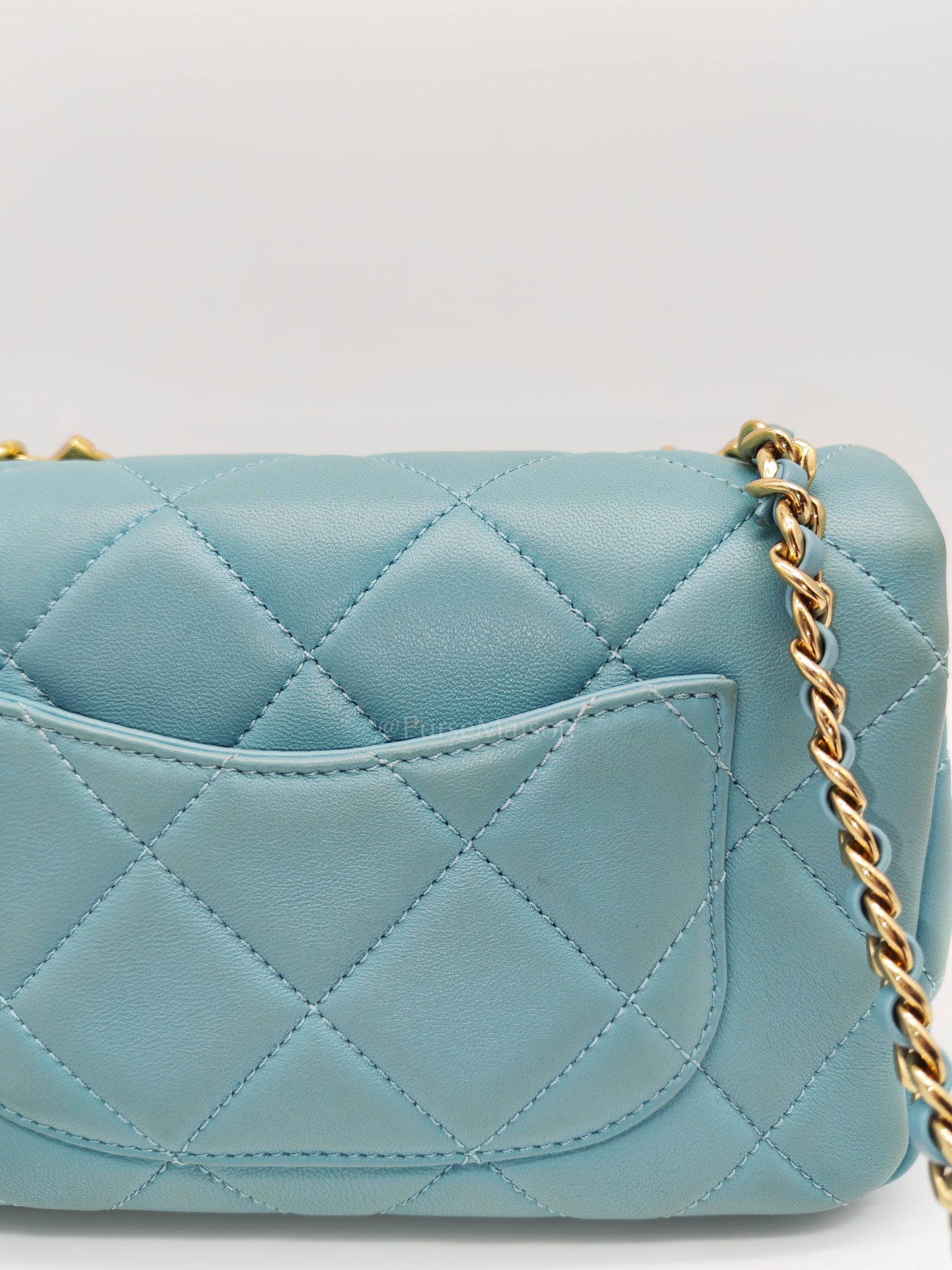 Mini CC Crystal Logo Chain Flap Bag in Light Blue Quilted Lambskin Leather & Gold Hardware Microchip