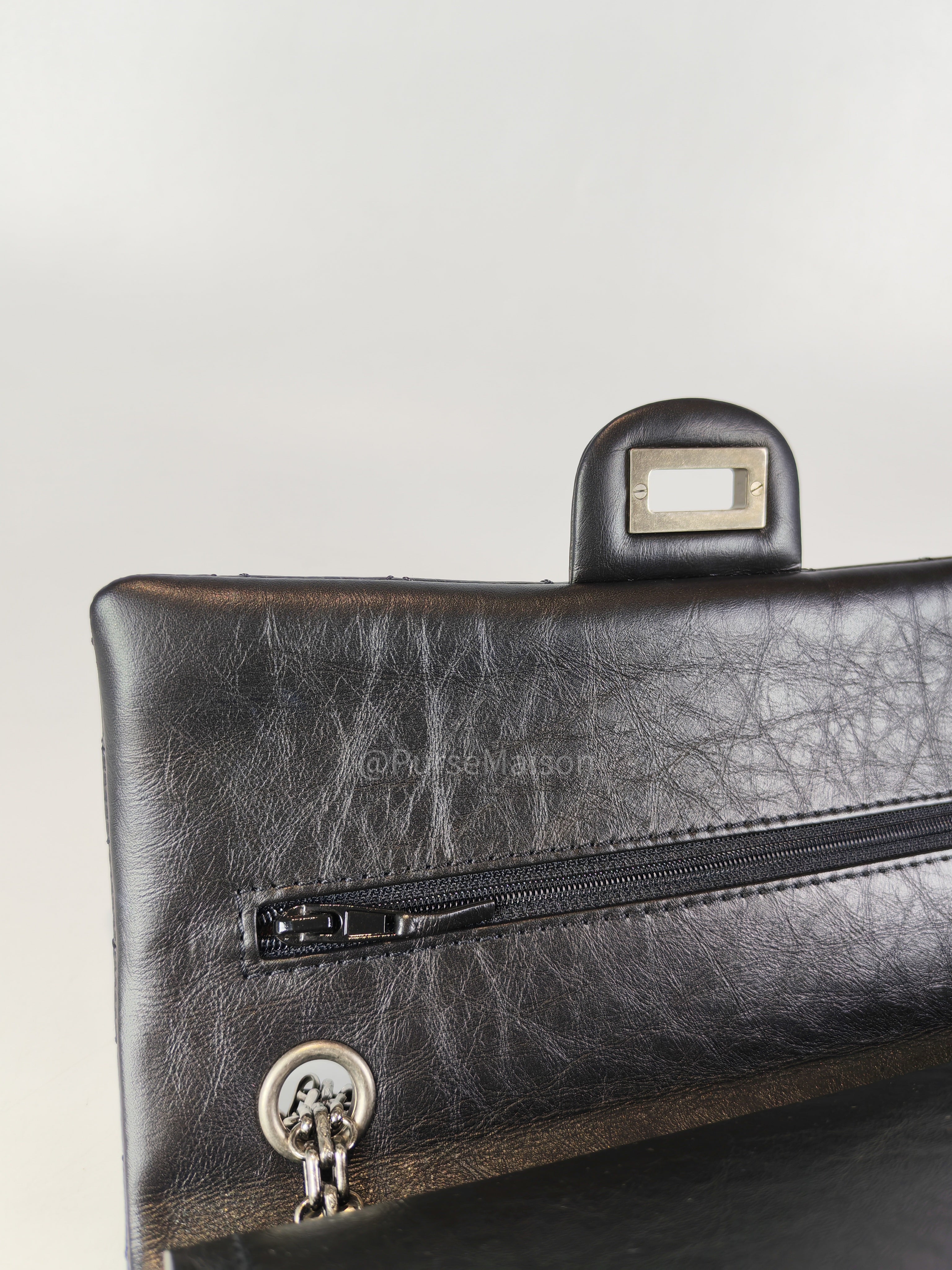 Reissue Small in Black Aged Calfskin Leather and Ruthenium Hardware (Microchip) | Purse Maison Luxury Bags Shop