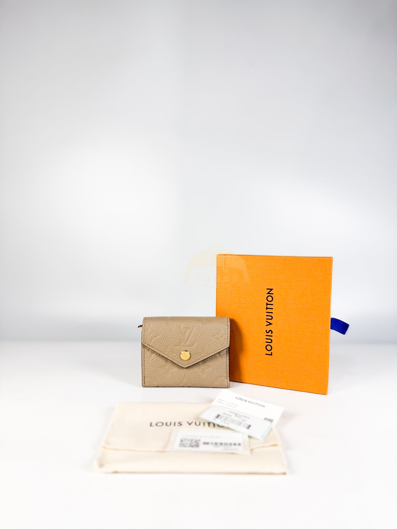 Rosalie Wallet in Tourterelle Monogram Empreinte Leather (Microchip) | Purse Maison Luxury Bags Shop