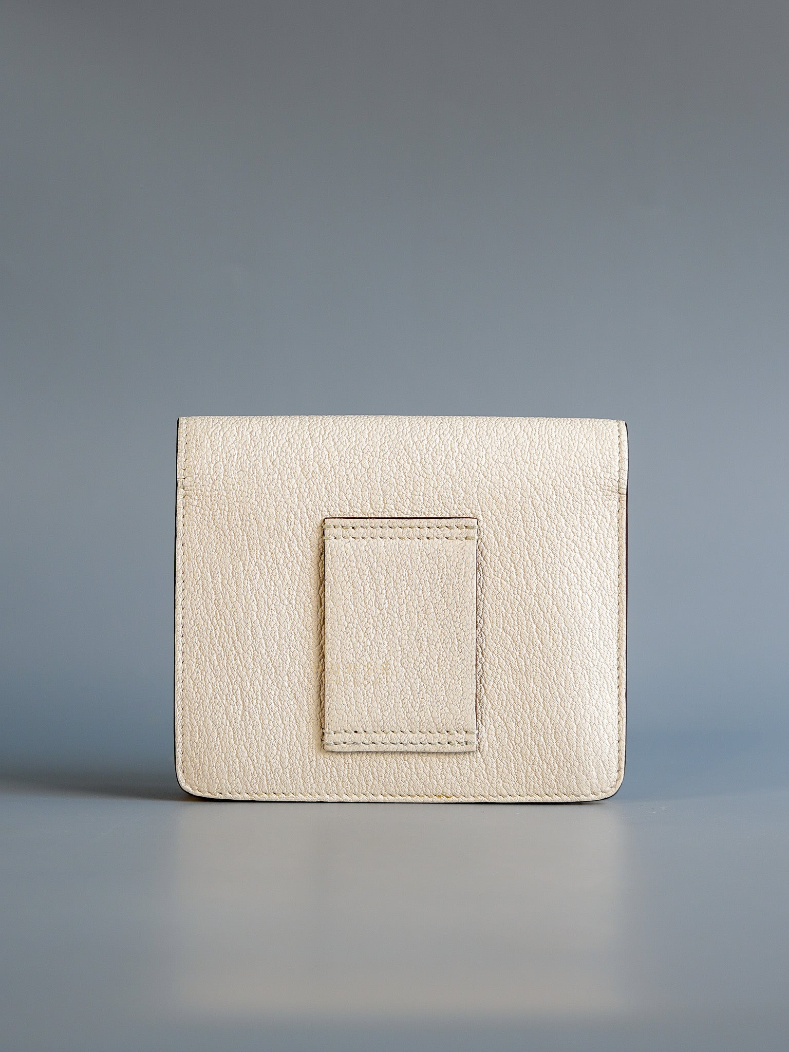 Roulis Slim Compact in Nata Chevre Mysore Leather Stamp B (2023) | Purse Maison Luxury Bags Shop