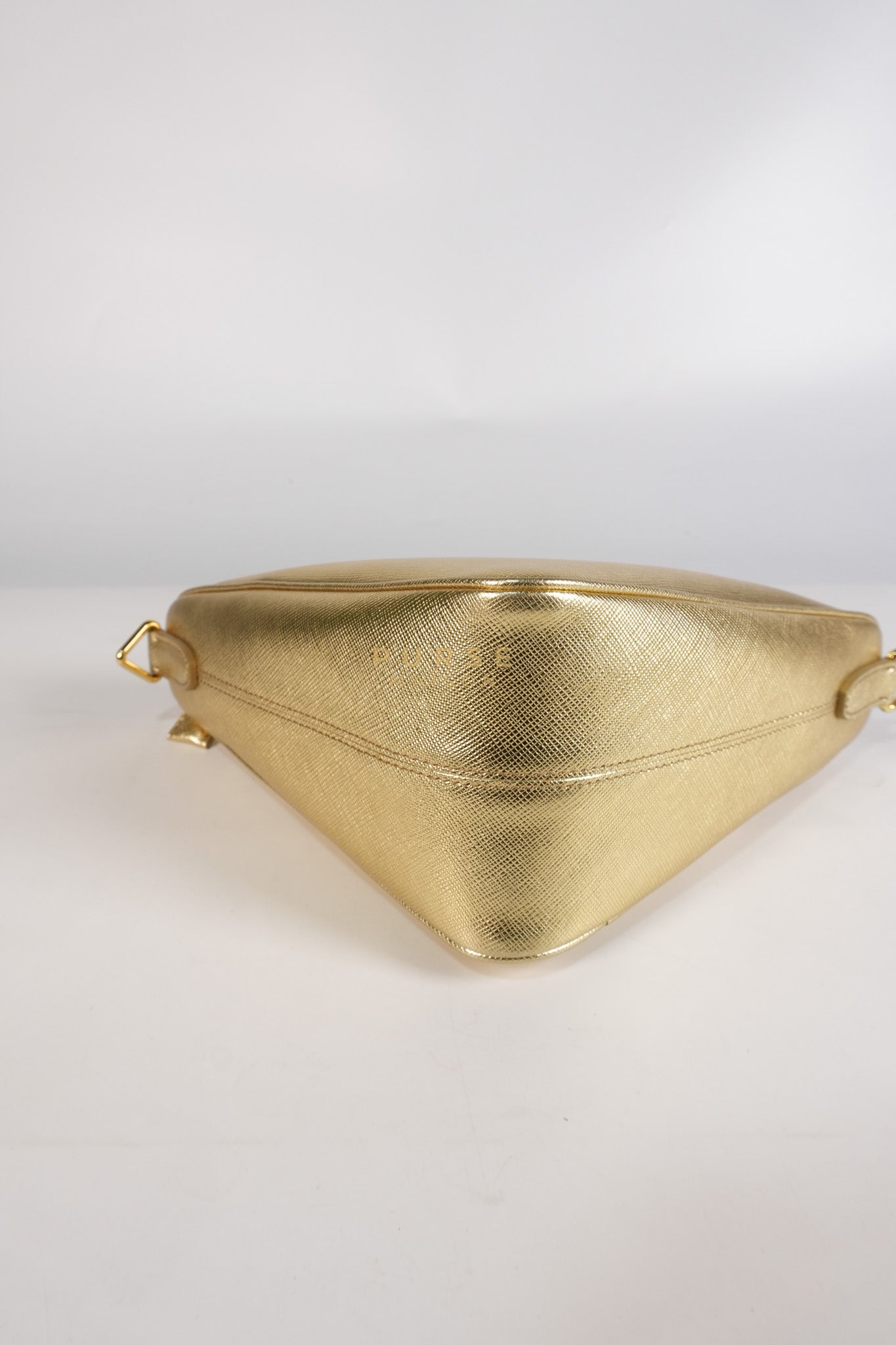 Saffiano Lux Triangle Shoulder Bag Platino in Gold | Purse Maison Luxury Bags Shop