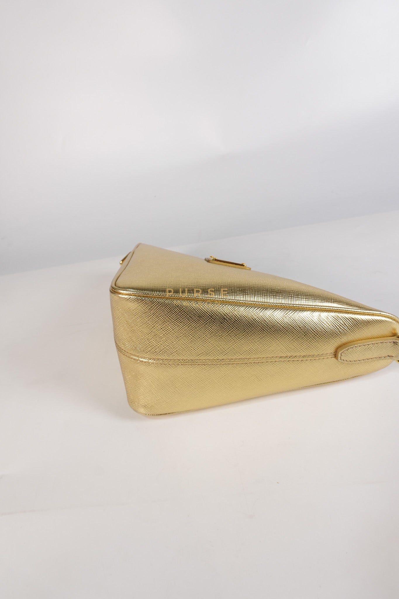 Saffiano Lux Triangle Shoulder Bag Platino in Gold | Purse Maison Luxury Bags Shop