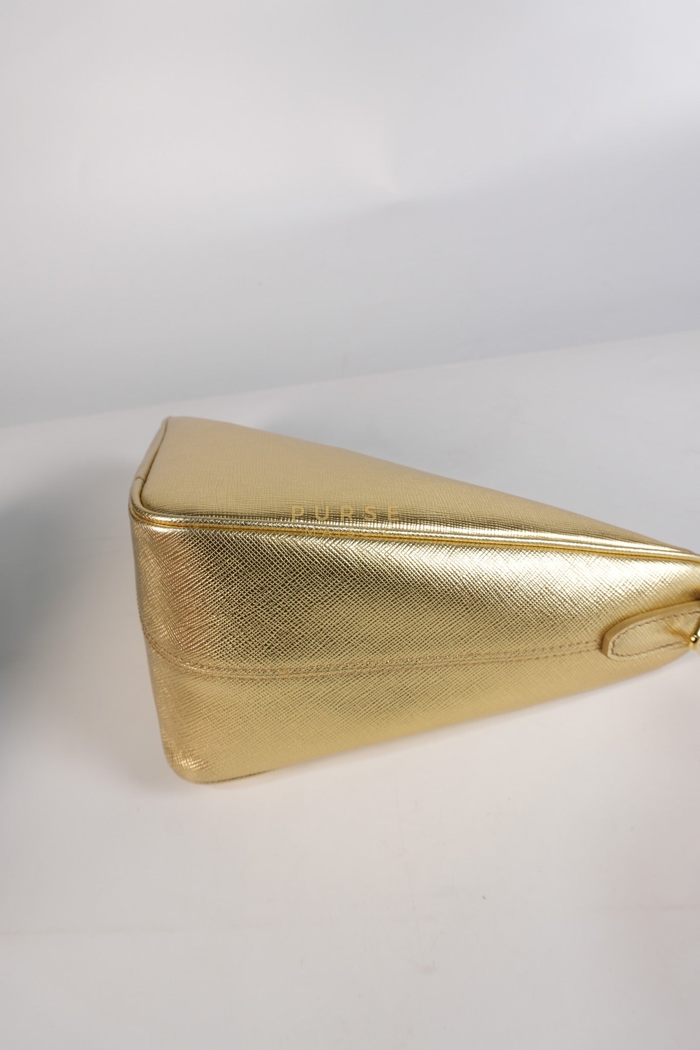 Saffiano Lux Triangle Shoulder Bag Platino in Gold | Purse Maison Luxury Bags Shop