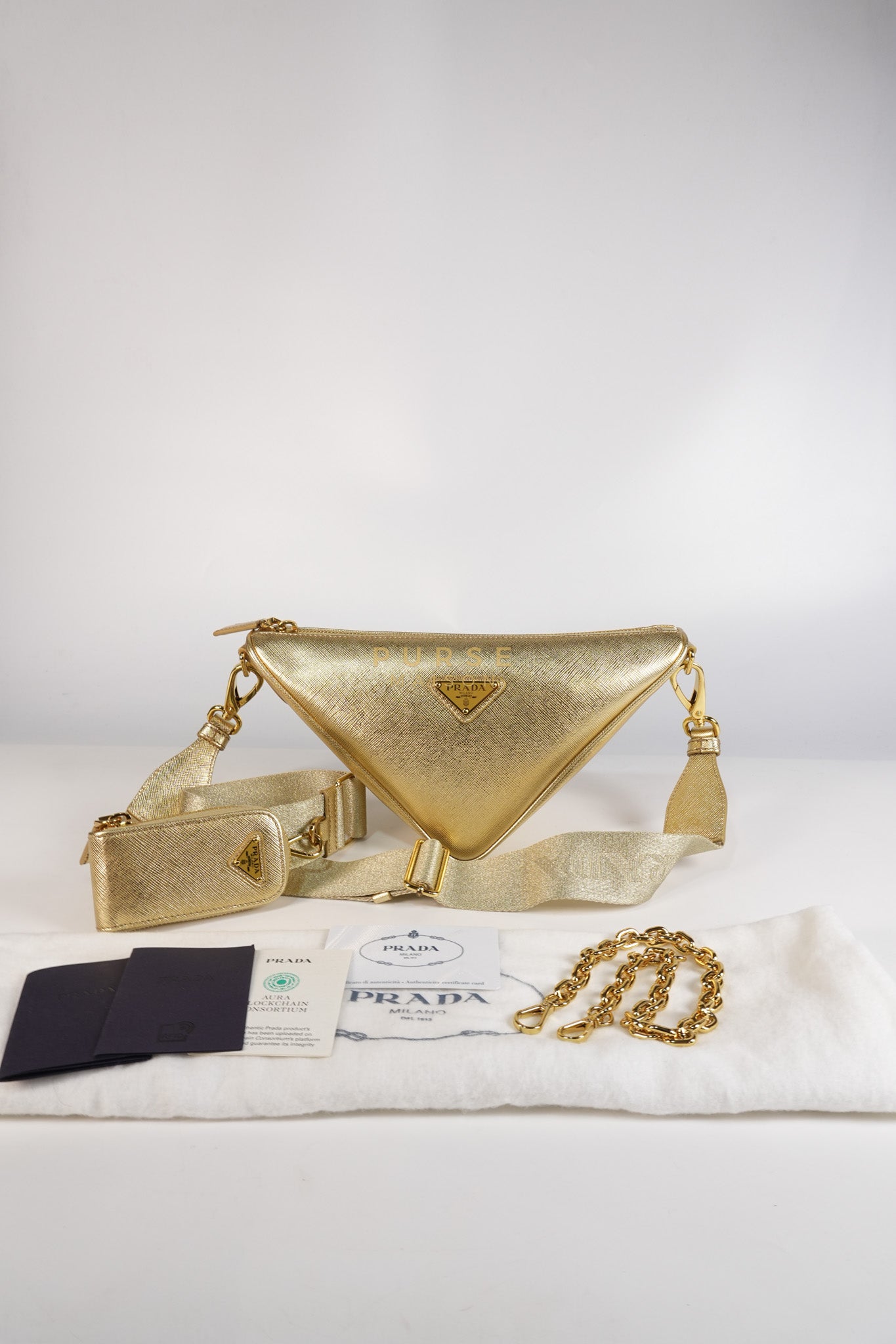 Saffiano Lux Triangle Shoulder Bag Platino in Gold | Purse Maison Luxury Bags Shop
