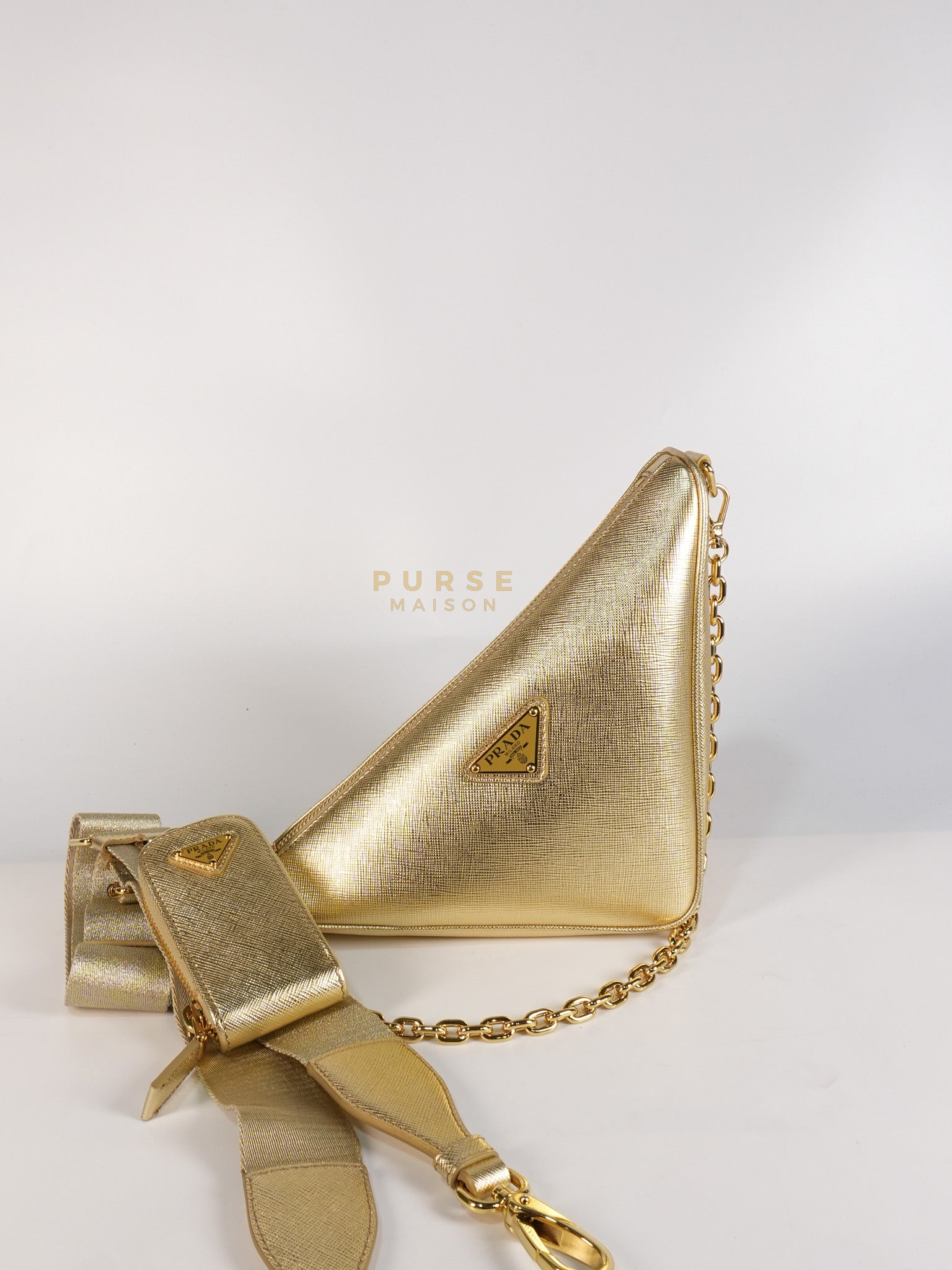 Saffiano Lux Triangle Shoulder Bag Platino in Gold | Purse Maison Luxury Bags Shop