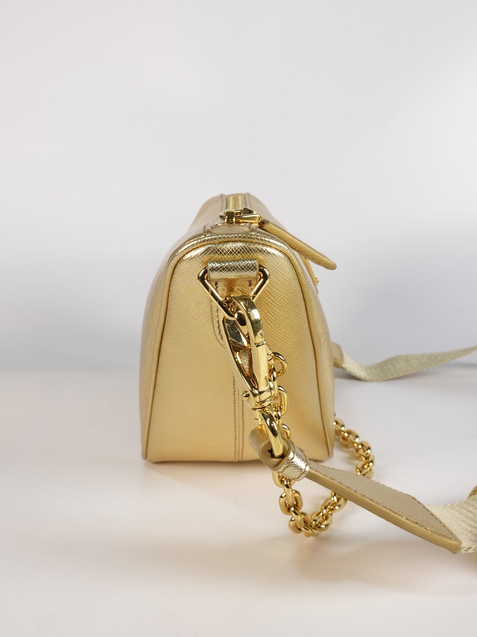 Saffiano Lux Triangle Shoulder Bag Platino in Gold | Purse Maison Luxury Bags Shop