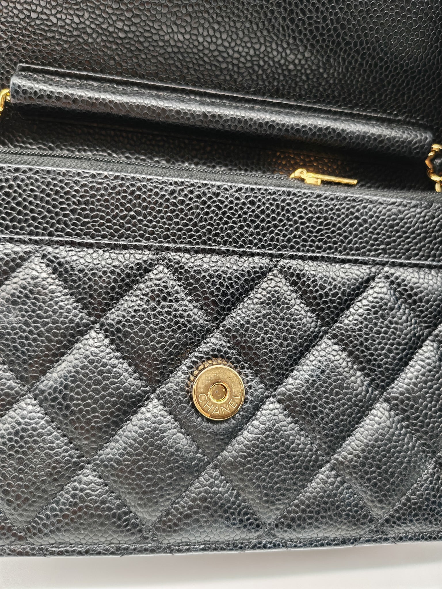 Wallet On Chain (WOC) in Black Quilted Caviar Leather and Gold Hardware Microchip